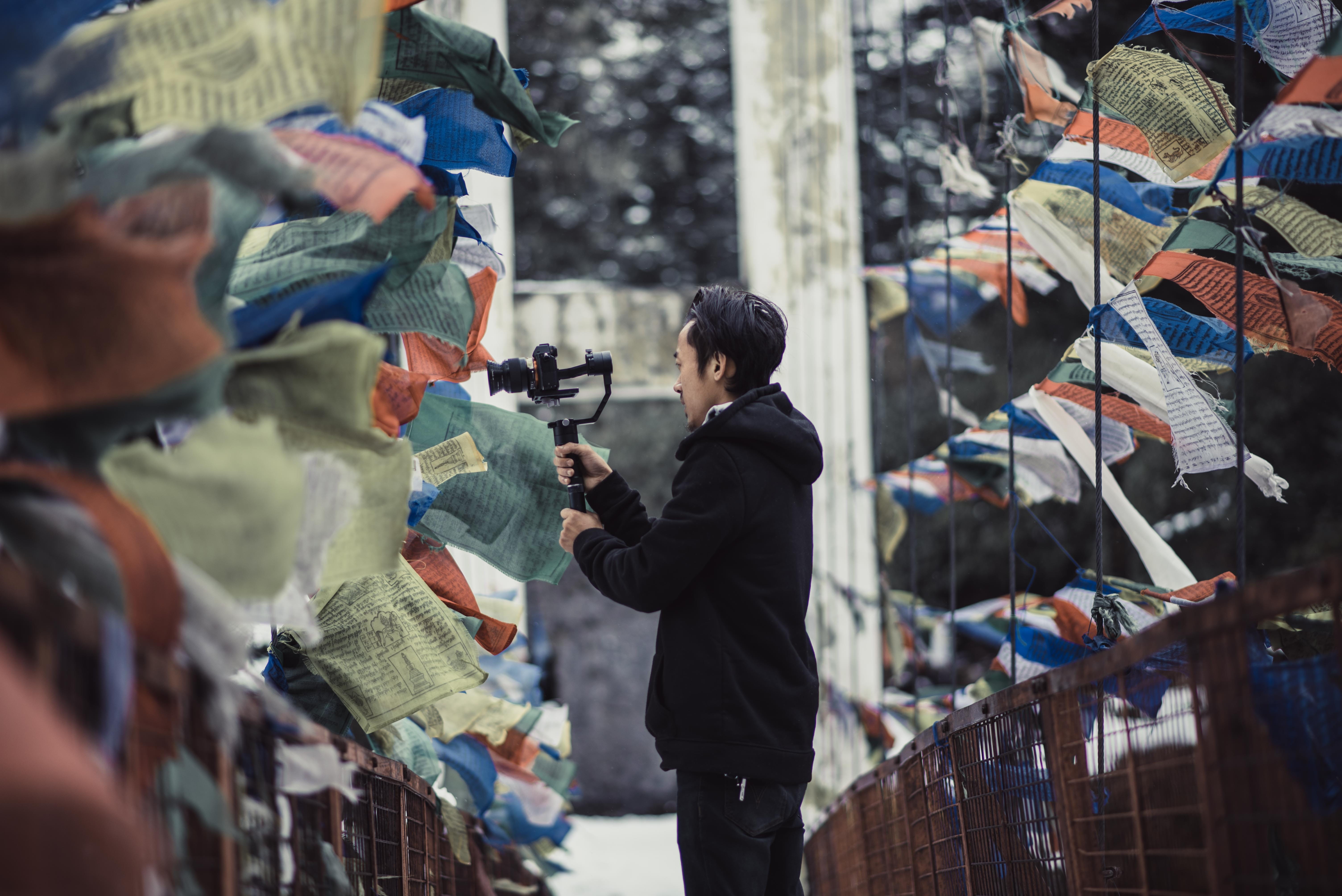 crowd, camera, friend, prayer flag, store, god, shopping, man, people, outdoors, wave, cultures, market, women, men, street, videographer, city, photographer, HD Wallpaper
