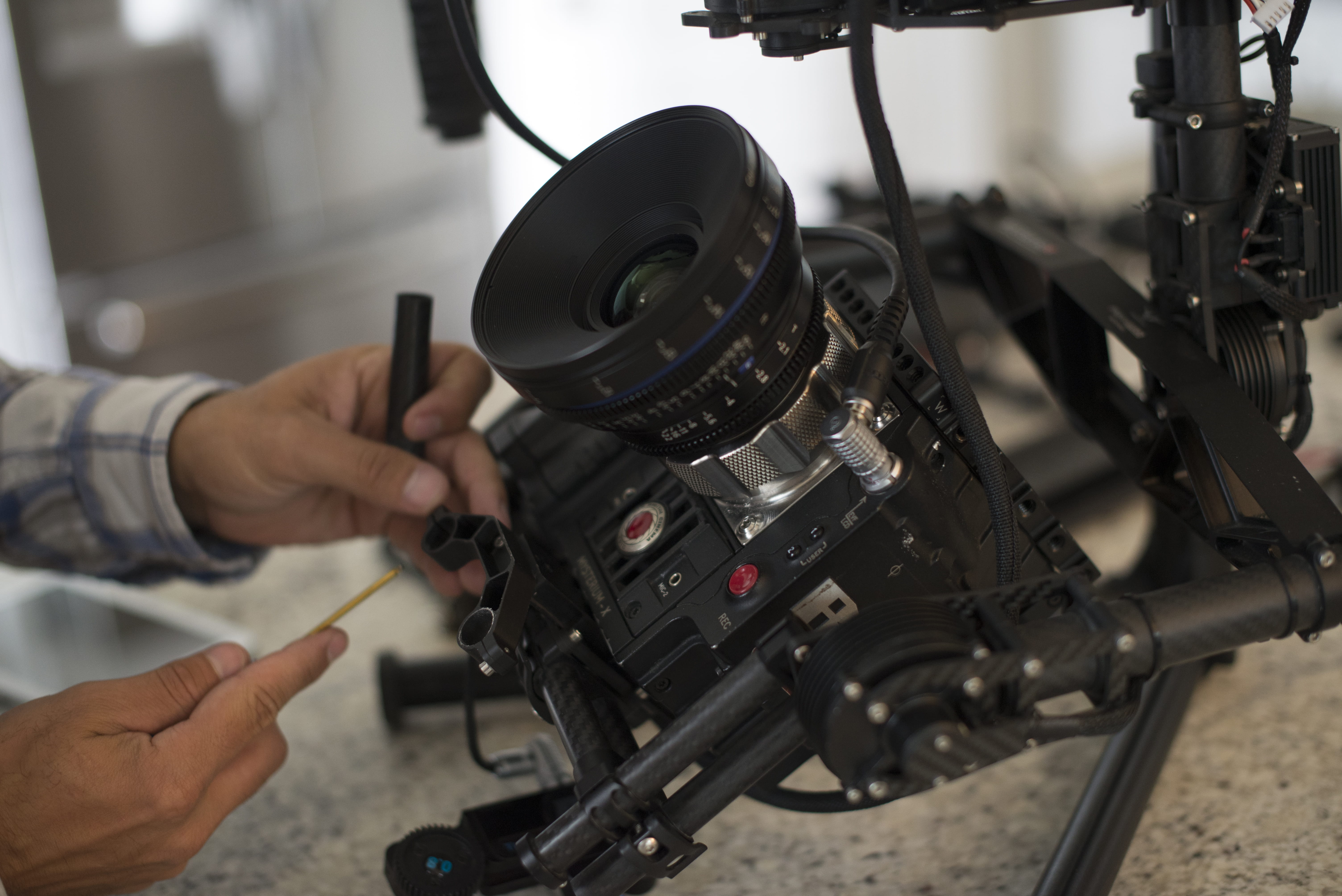 focus on foreground, producer, indoors, body part, director, one person, red, occupation, gear, commercial, 5K, machinery, video, shutter, lens, human hand, HD Wallpaper