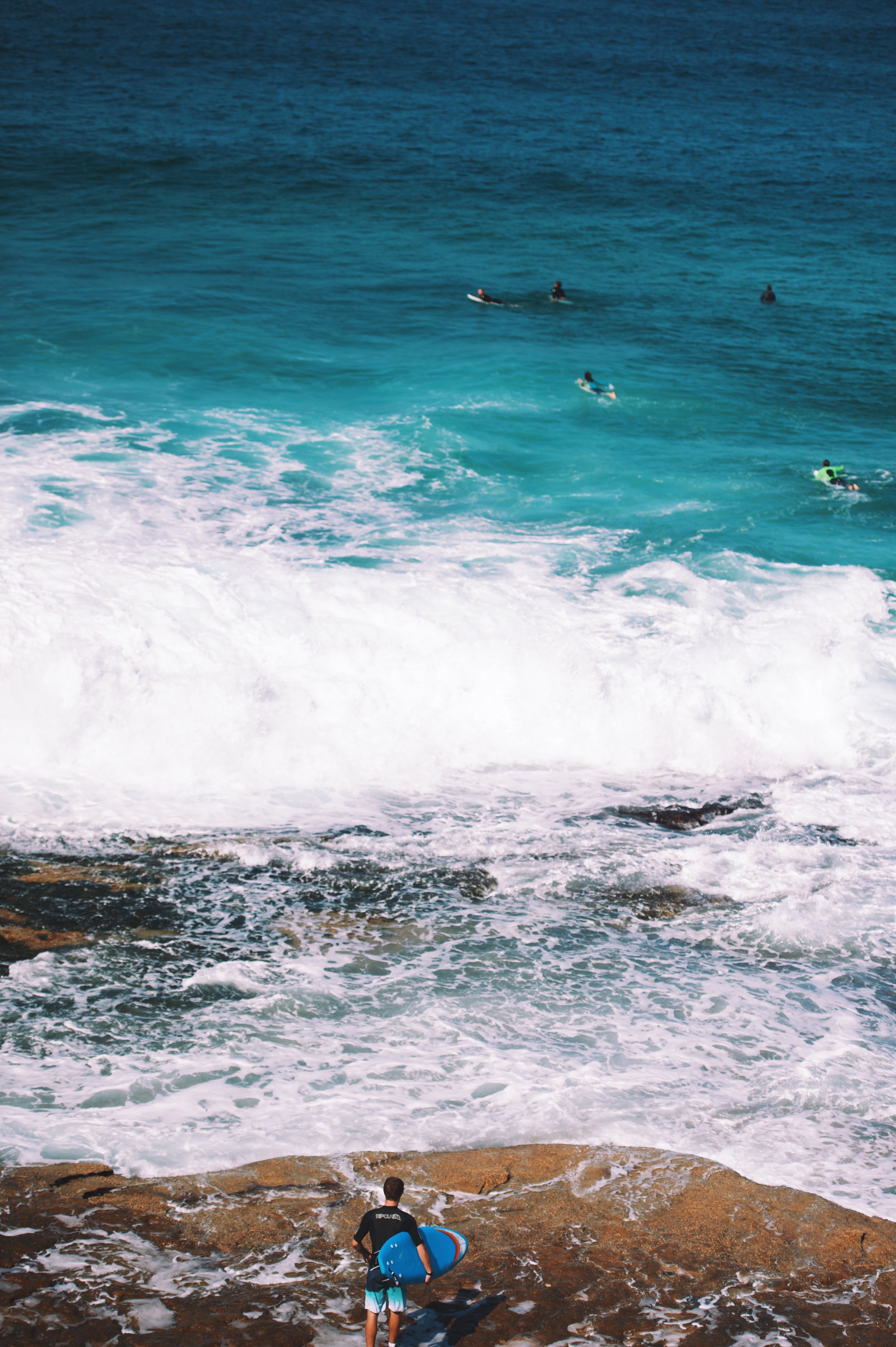 beauty in nature, beach, wave, travel, ocean, surfer, guy, swimming, seashore, surfing, water, real people, outdoor, lifestyles, blue, man, skimboard, carrying, Phone HD Wallpaper