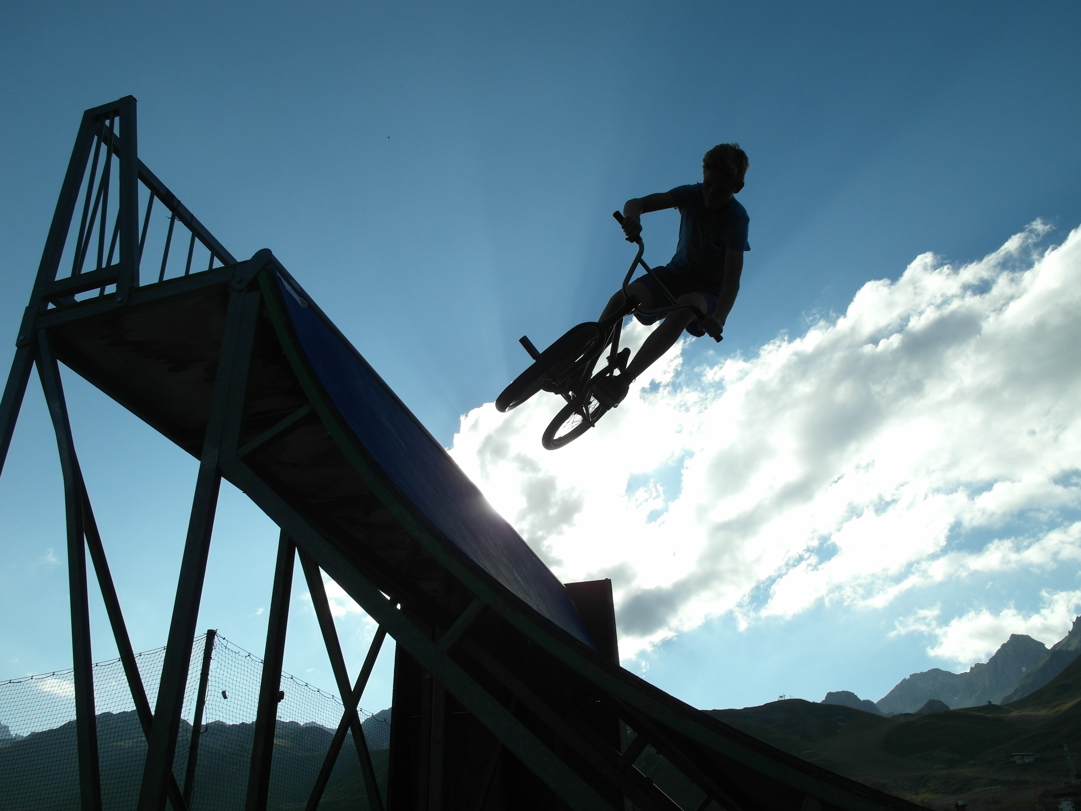 silhouette, lifestyles, bicycle, extreme sports, shadow, outdoors, acrobatics, sport, full length, fly, one person, low angle view, bmx, 2K, jumping, exhibition, HD Wallpaper