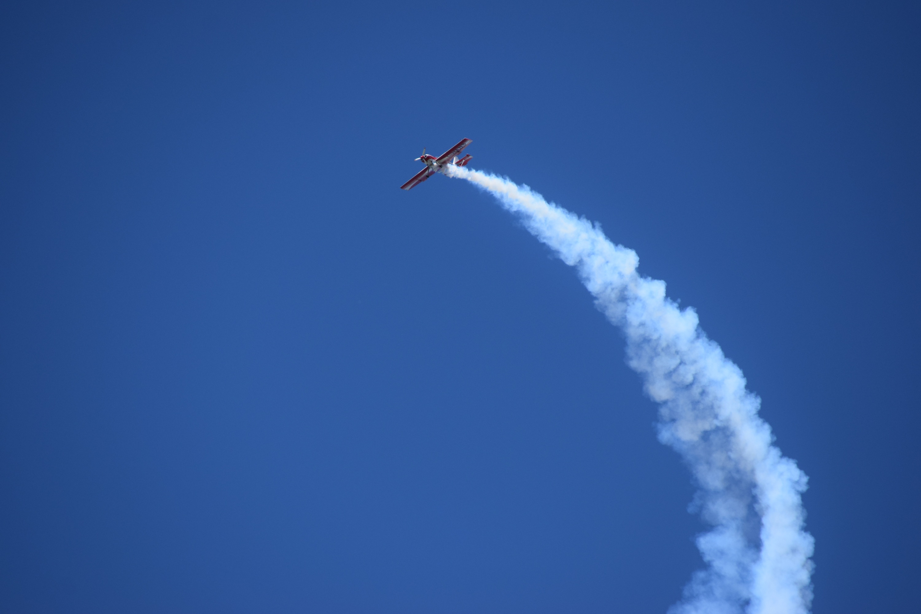 air, aerobatics, vapor trail, day, air vehicle, stunt plane, 2K, low angle view, aerospace industry, sky, nature, motion, cloud - sky, airplane, outdoors, HD Wallpaper