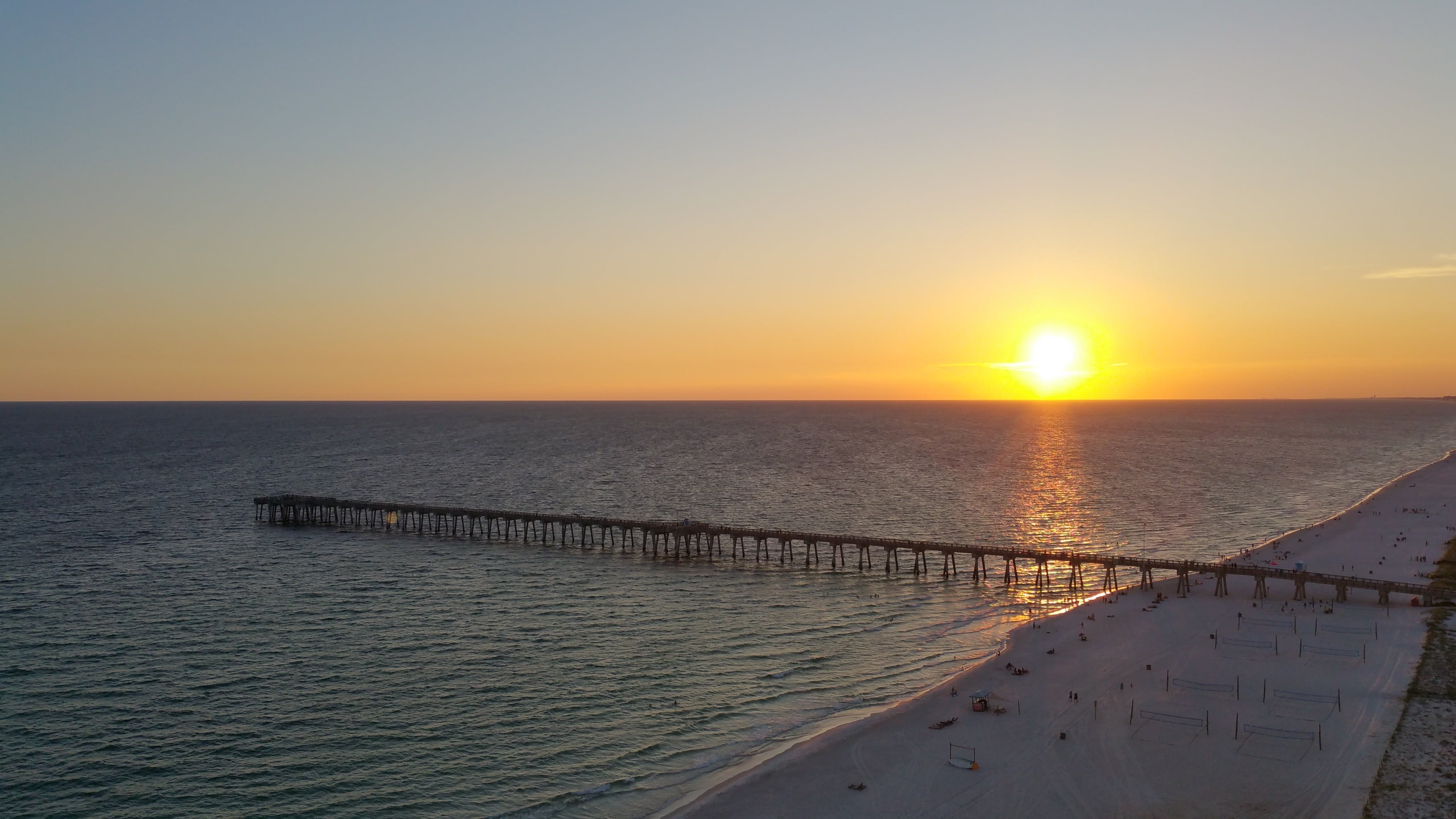 horizon, sea, panama city beach, orange color, idyllic, copy space, travel, natural, gulf of mexico, 2K, sunlight, no people, dock, sunset, water, clear sky, HD Wallpaper