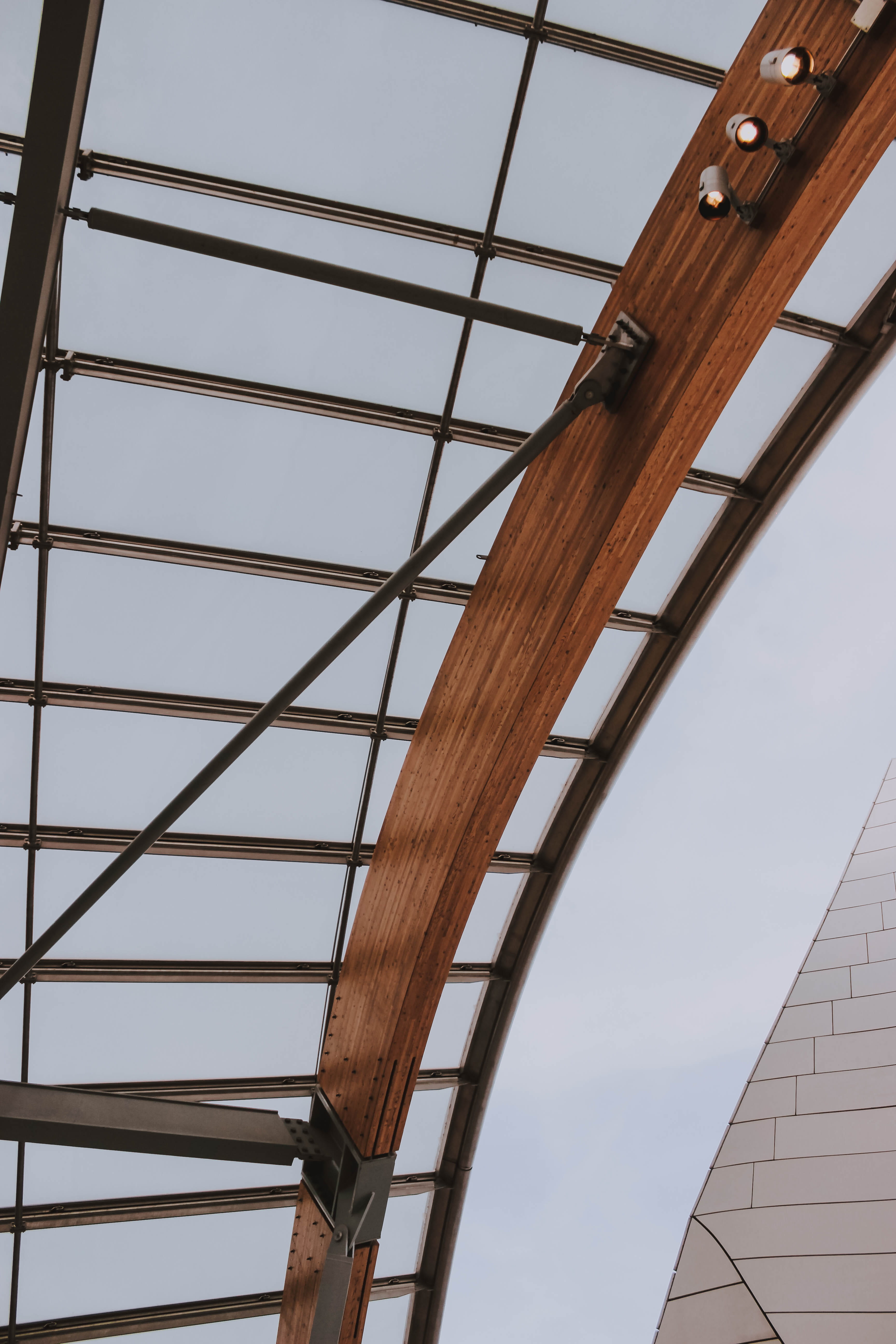 urban, arched, condo, connection, 5K, low, development, metal, day, downtown, pattern, angle, pedestrian, built structure, girder, window, city, building, Phone HD Wallpaper