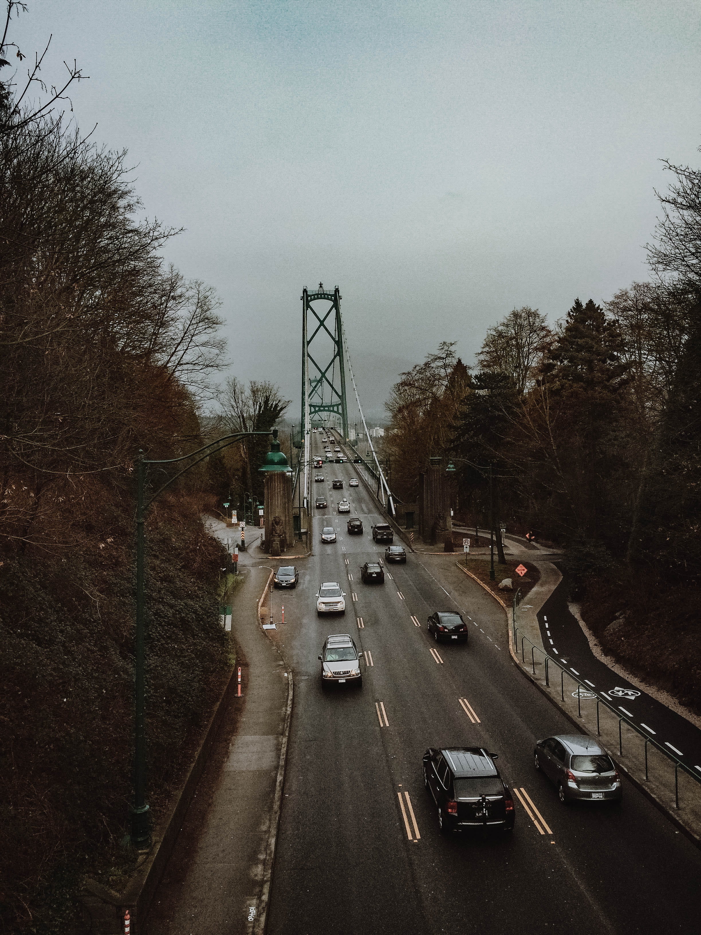plant, street, motor vehicle, traffic, mode of transportation, vancouver, canada, architecture, car, transportation, tree, sign, lions gate bridge road, Phone HD Wallpaper