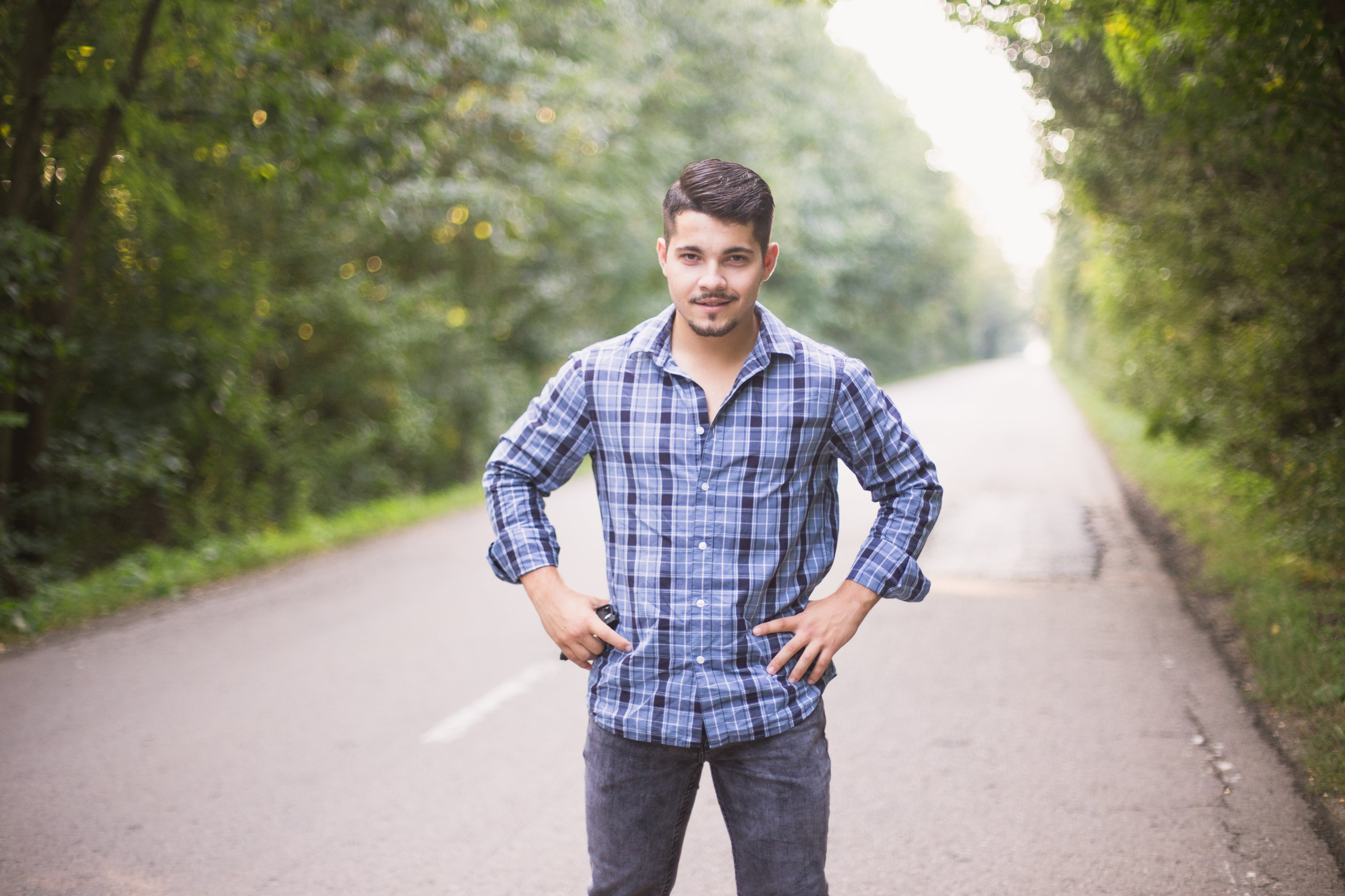 young men, sport, funny, three quarter length, shirt, standing, outdoors, portrait, forest, road, looking at camera, blue, man, beauty, black, boy, smiling, HD Wallpaper