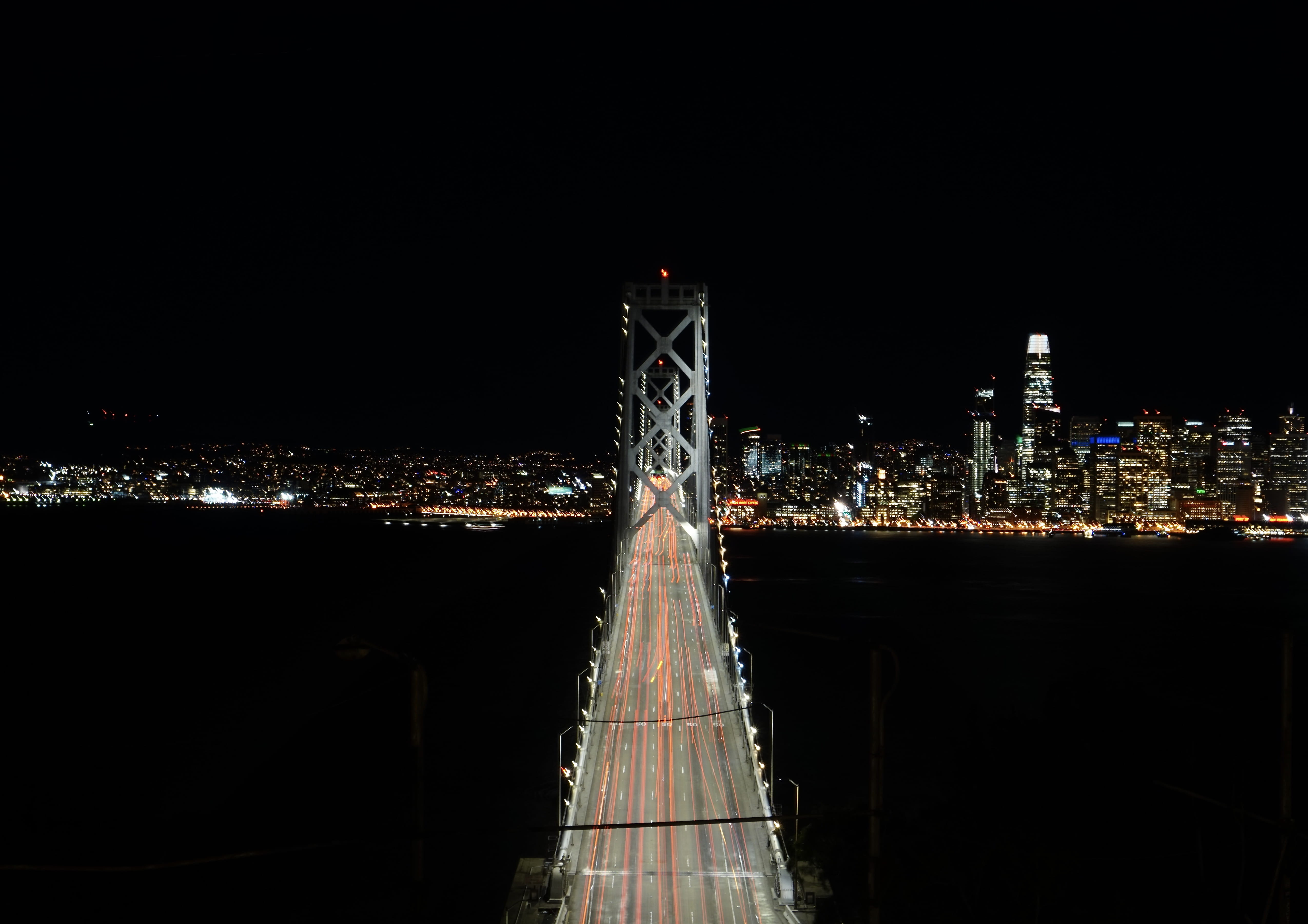 bridge, city, bay bridge, boardwalk, banister, tower, outdoors, building exterior, travel destinations, metropolis, building, motion, gray, skyscraper, HD Wallpaper