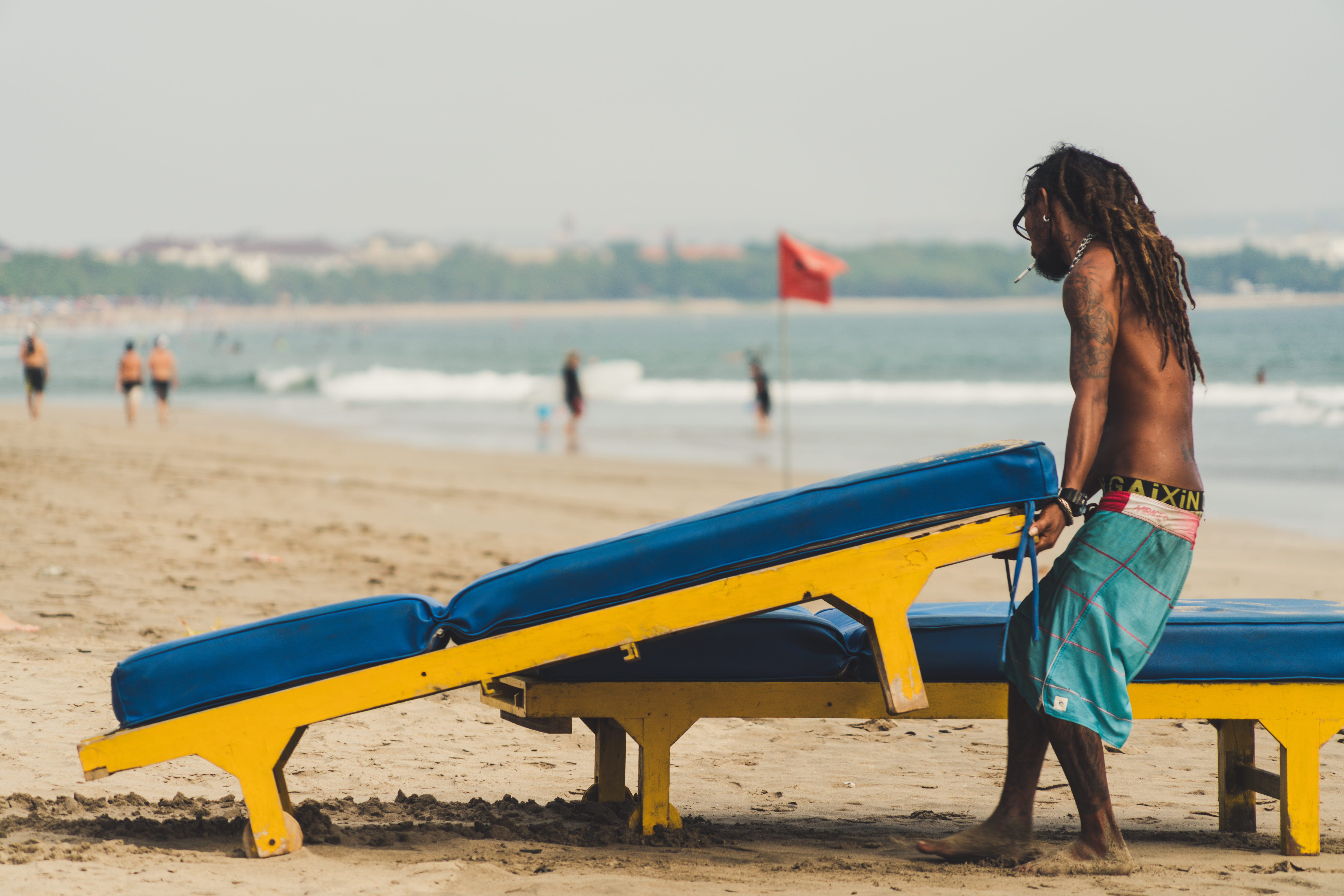 leisure activity, sea, real people, vacations, 8K, sand, day, beach, nature, shirtless, man, one person, carrying, sunlounger, lifestyles, land, hairstyle, HD Wallpaper