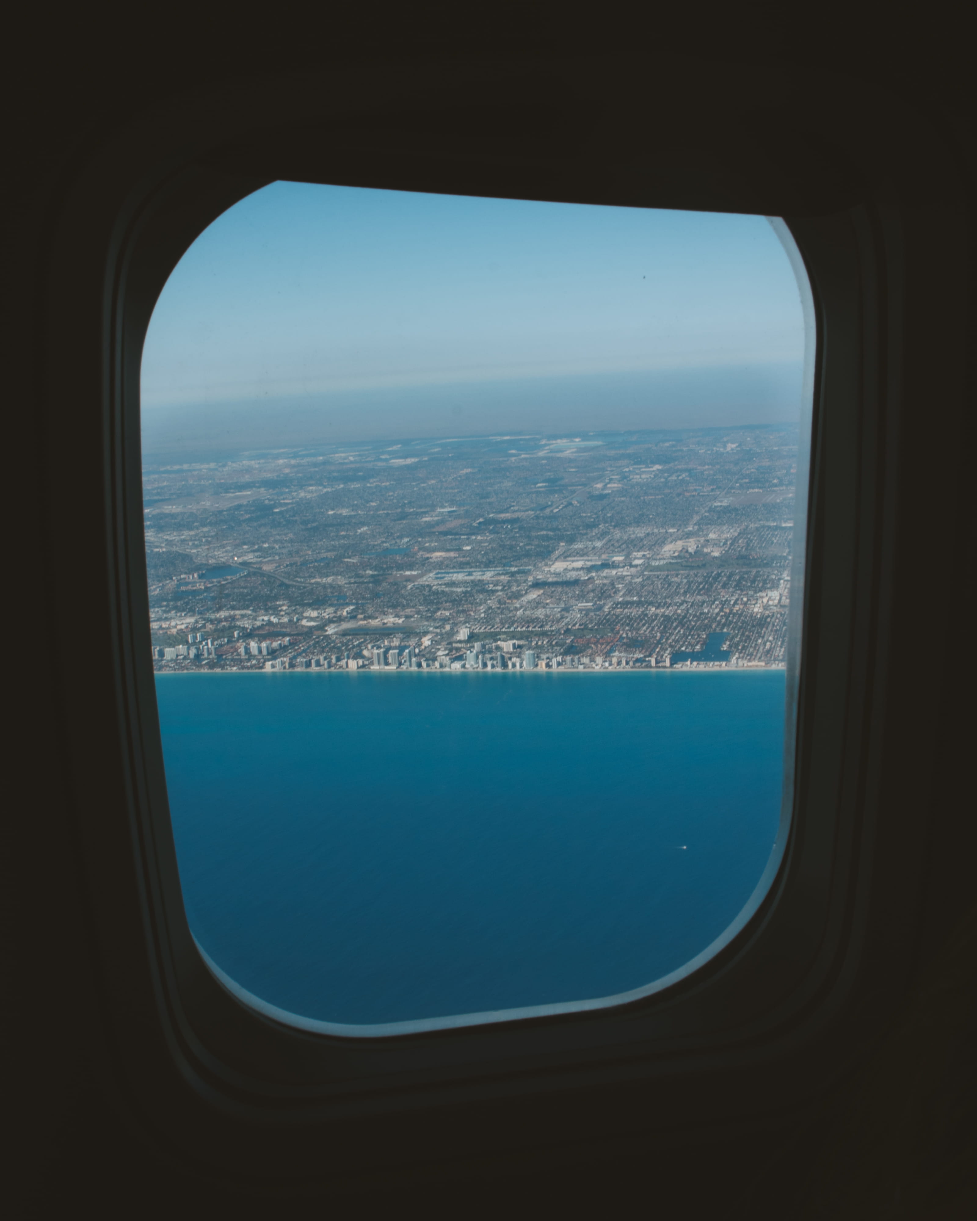 airplane, mode of transportation, beauty in nature, sea, aerial view, miami beach, vehicle interior, landscape, transportation, glass - material, flying, Phone HD Wallpaper