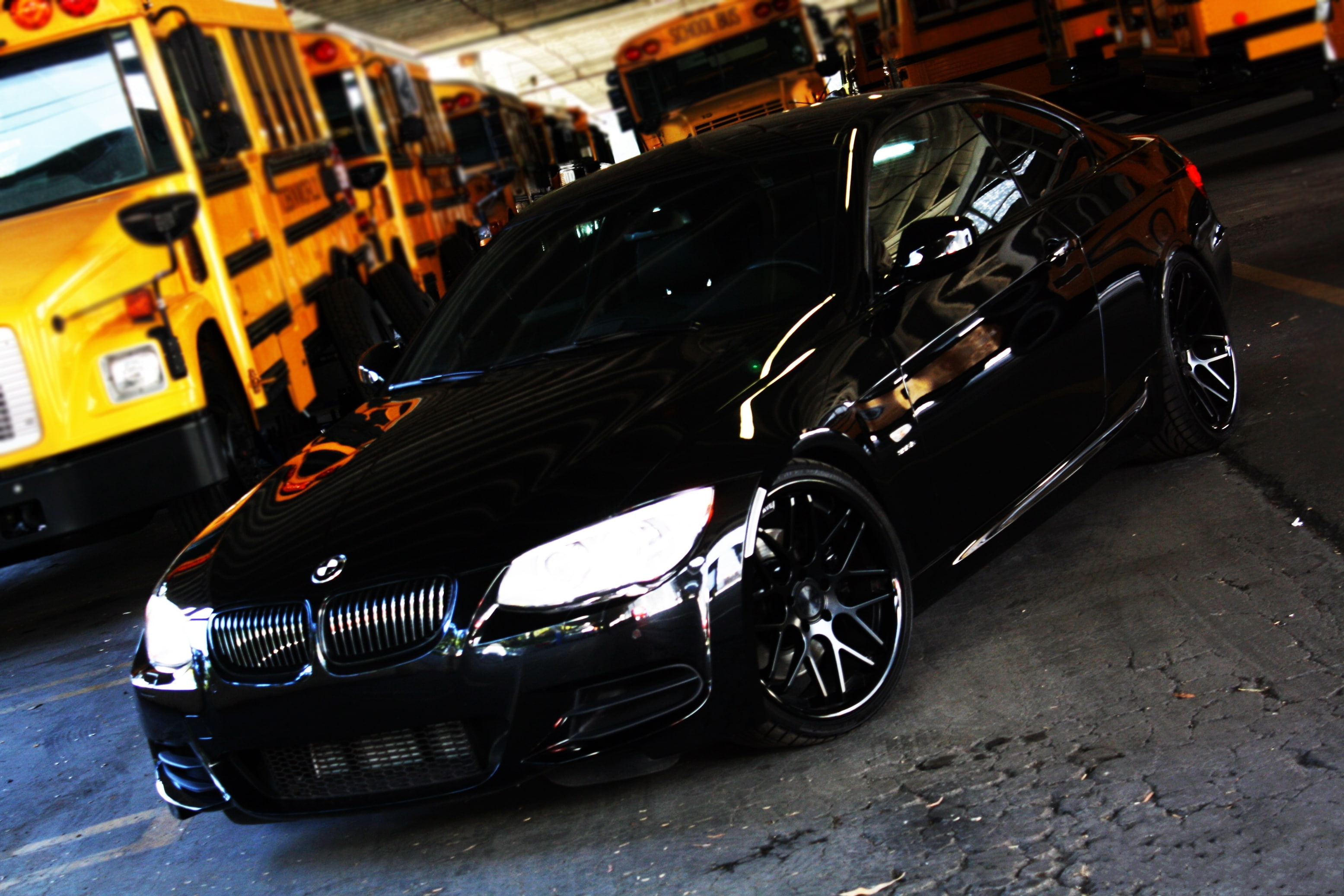 mode of transportation, 2K, day, 335i, land vehicle, focus on foreground, BMW, taxi, wheel, school bus, street, outdoors, stationary, garage, road, black, HD Wallpaper