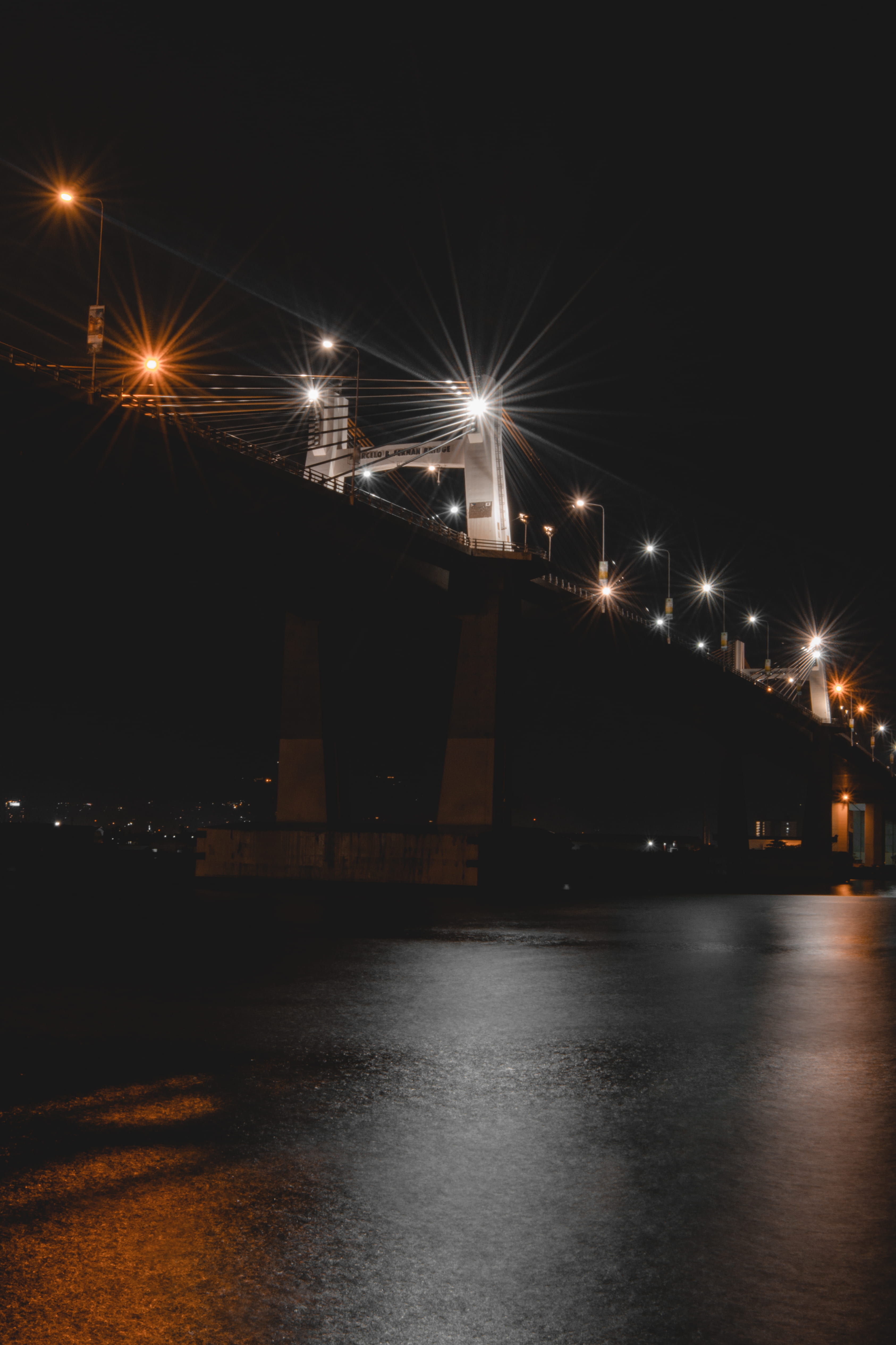 architecture, waterfront, light, lighting equipment, town, urban, metropolis, building, dock, sunlight, outdoors, bridge, sky, road, mode of transportation, Phone HD Wallpaper