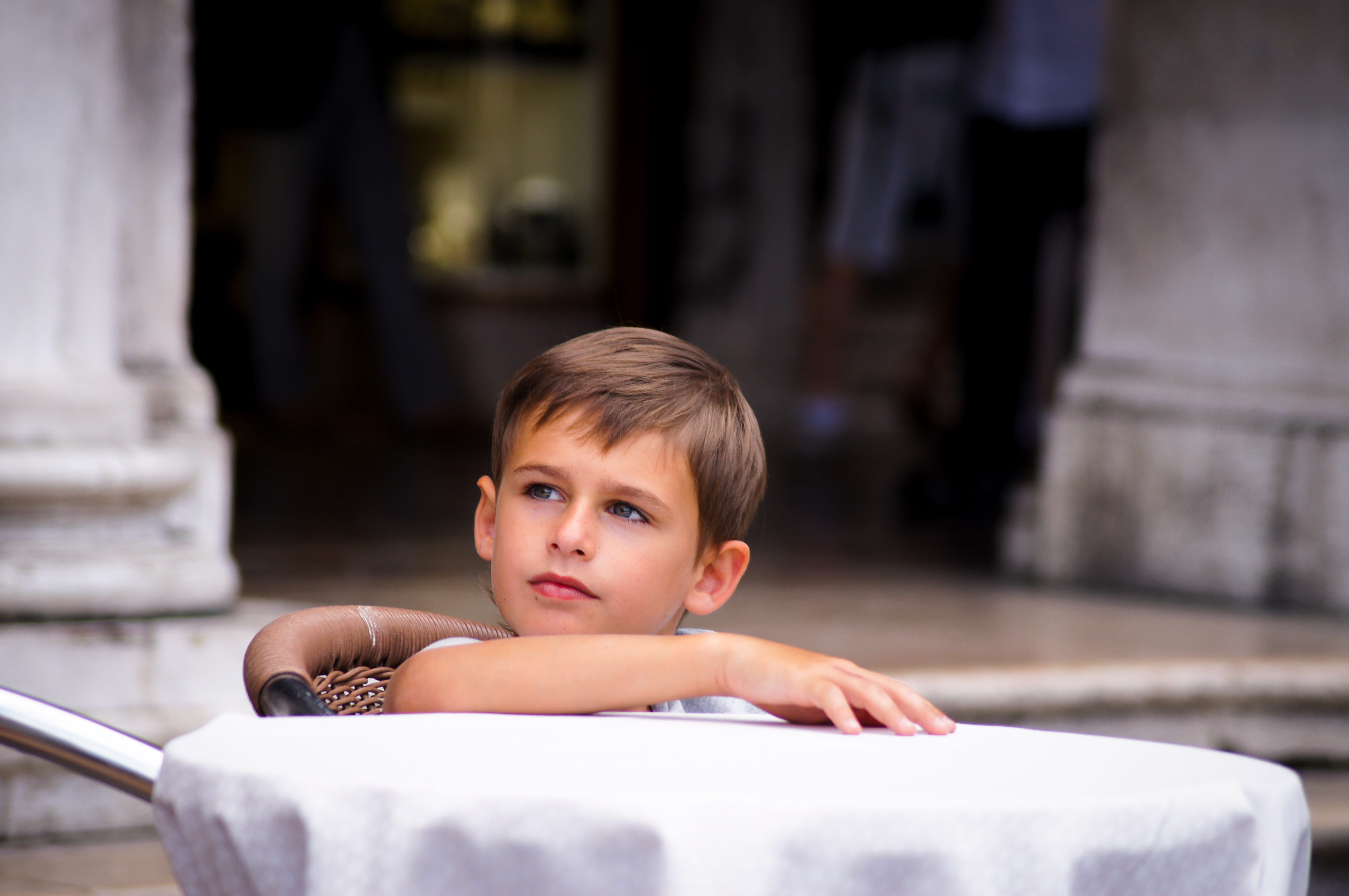 front, men, sitting, indoors, brown, portrait, males, offspring, chair, architecture, boy, sideways, 4K, child, childhood, human face, table, boys, looking, HD Wallpaper