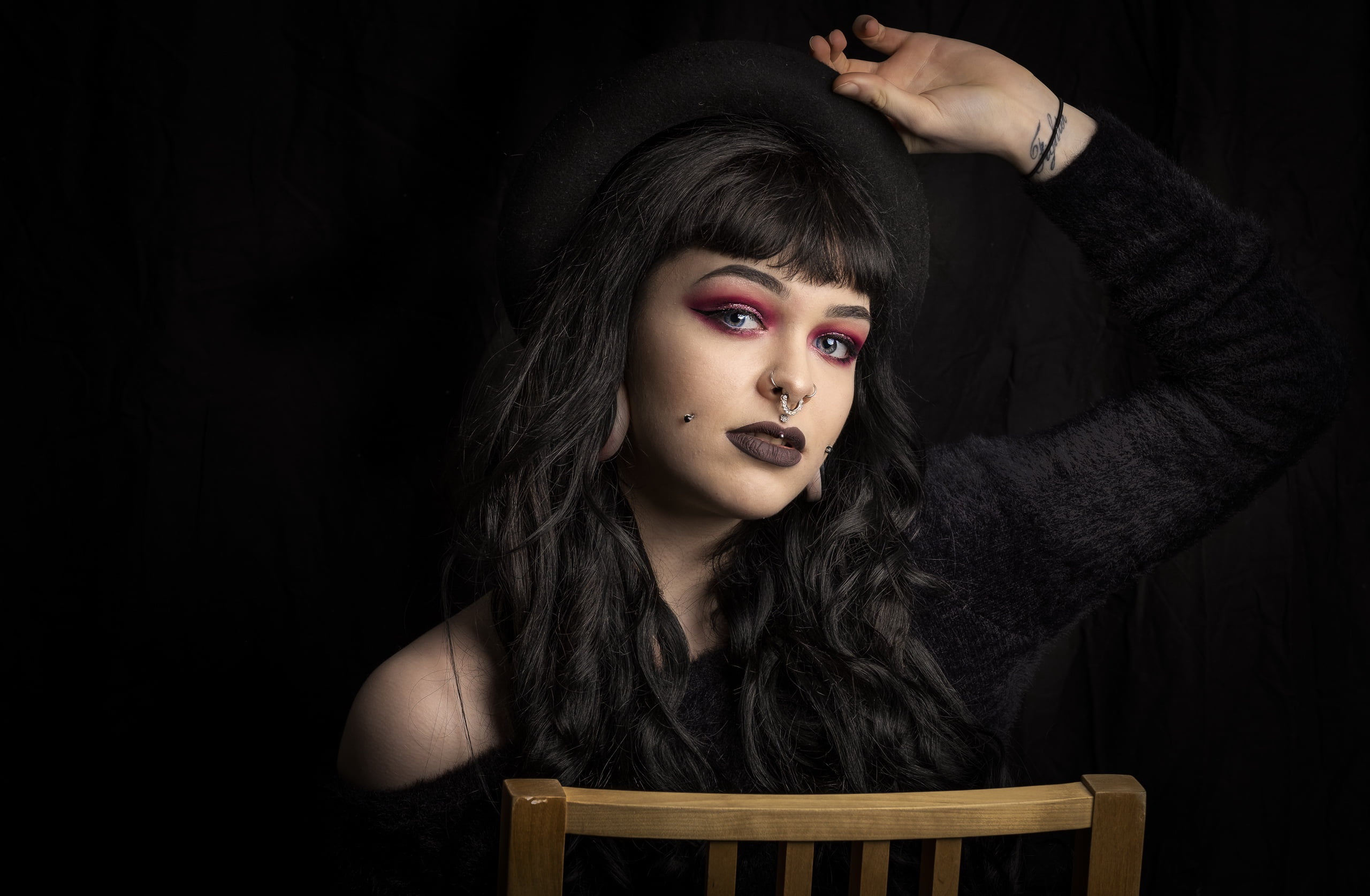 brunette, makeup, face, simple background, model, women, dark hair, piercing, tattoo, pierced cheeks, Stretched ears, nose ring, portrait, 2K, pierced, HD Wallpaper