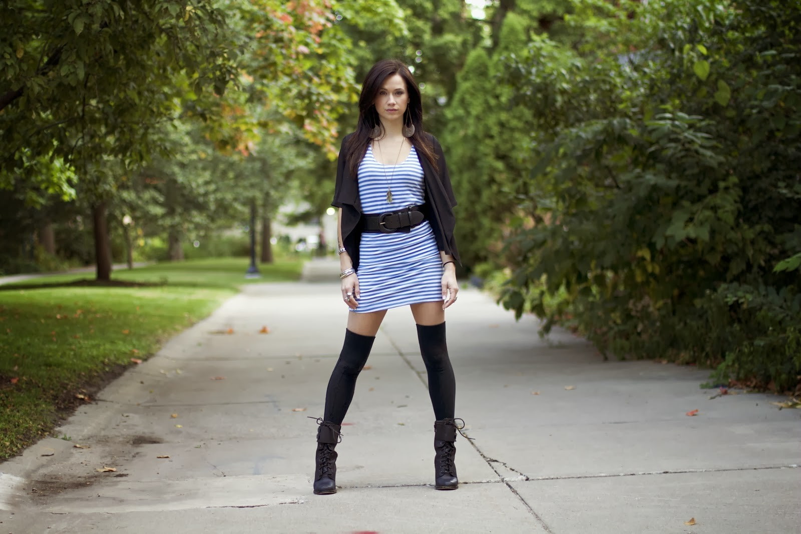 women model brunette long hair looking at viewer megan lyn women outdoors belt blue stripes skirt knee highs boots black tops trees park road grass earrings, HD Wallpaper