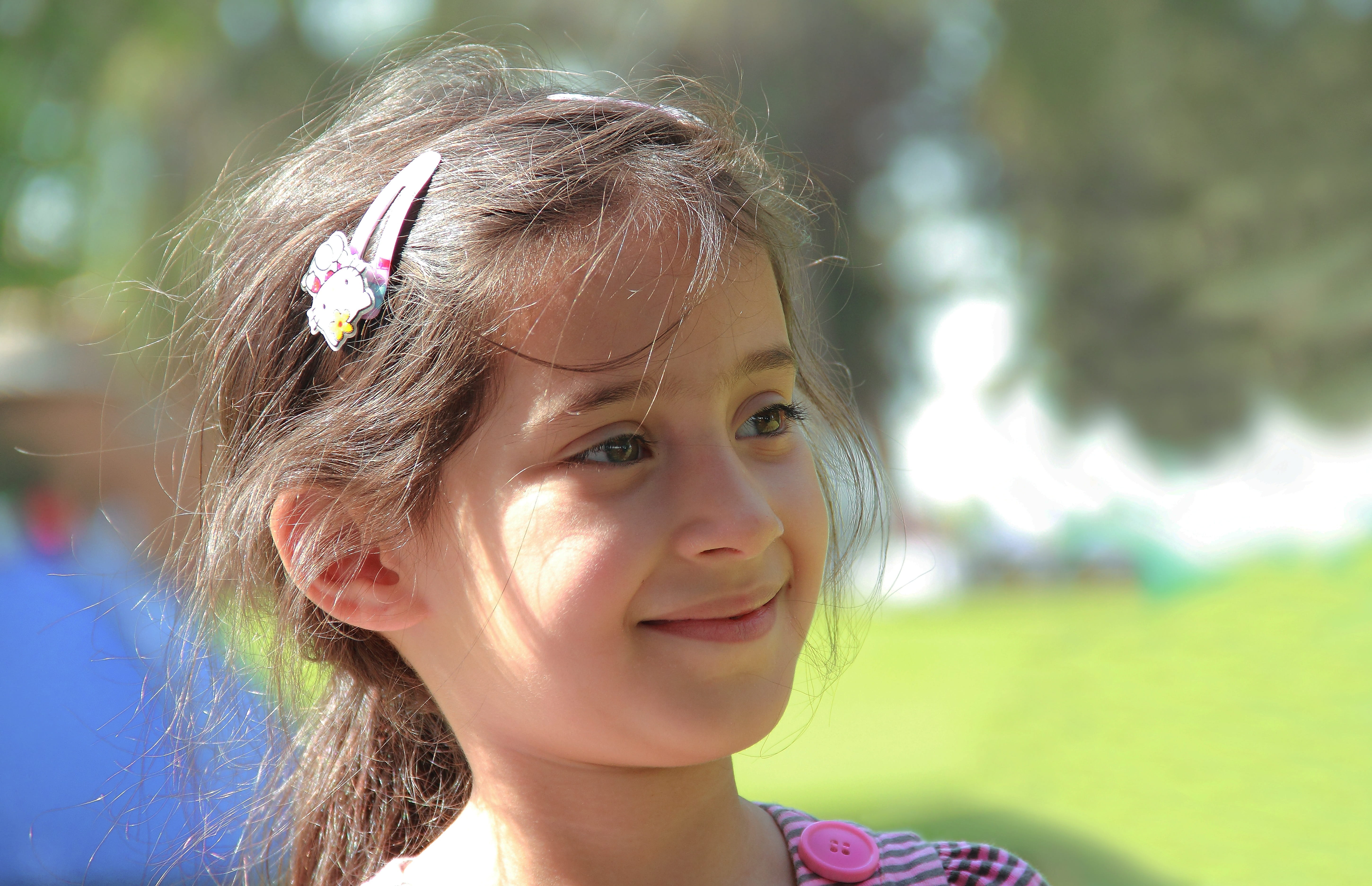 happiness, childhood, looking at camera, day, hair, baby, real people, tree, sweet, females, focus on foreground, smiling, park, lovely, close-up, innocence, HD Wallpaper