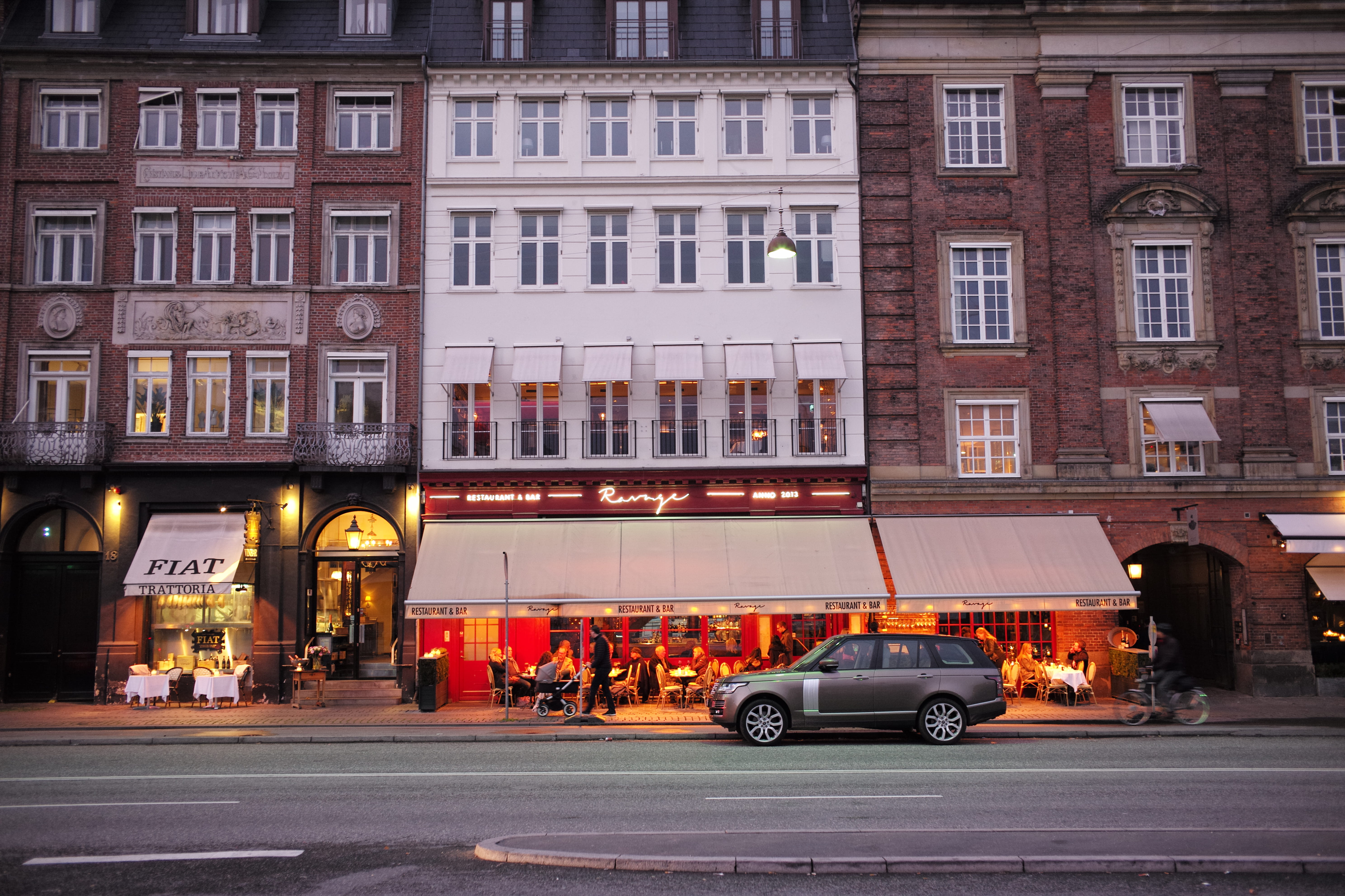 5K, window, incidental people, architecture, land vehicle, city life, car, denmark, transportation, city, building, built structure, illuminated, sign, HD Wallpaper
