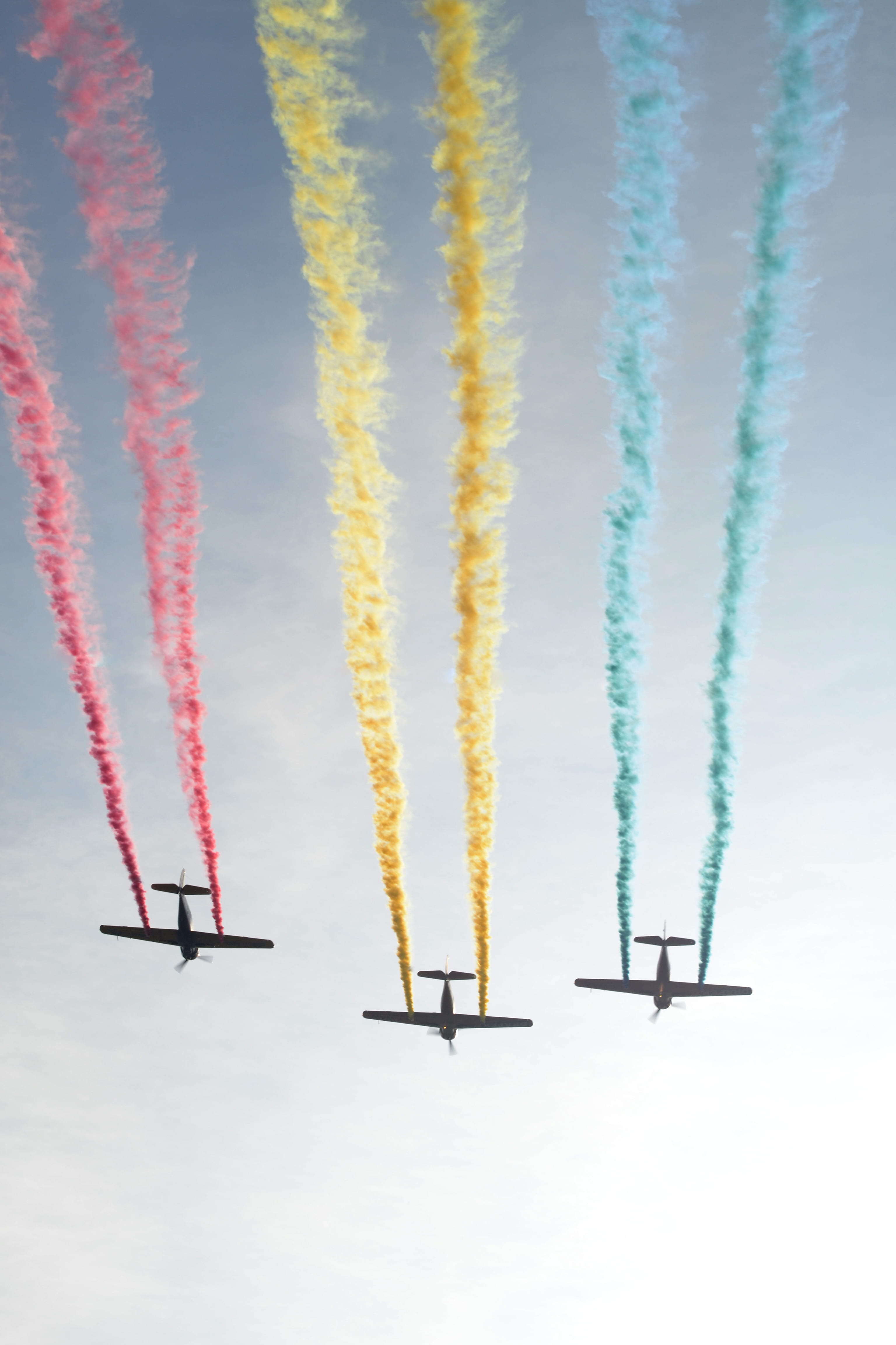 smoke, vapor trail, flight, aircraft, outdoors, aviation, air, air vehicle, biplane, in a row, sky, on the move, cloud - sky, three, colorful, flying, aeroplane, Phone HD Wallpaper