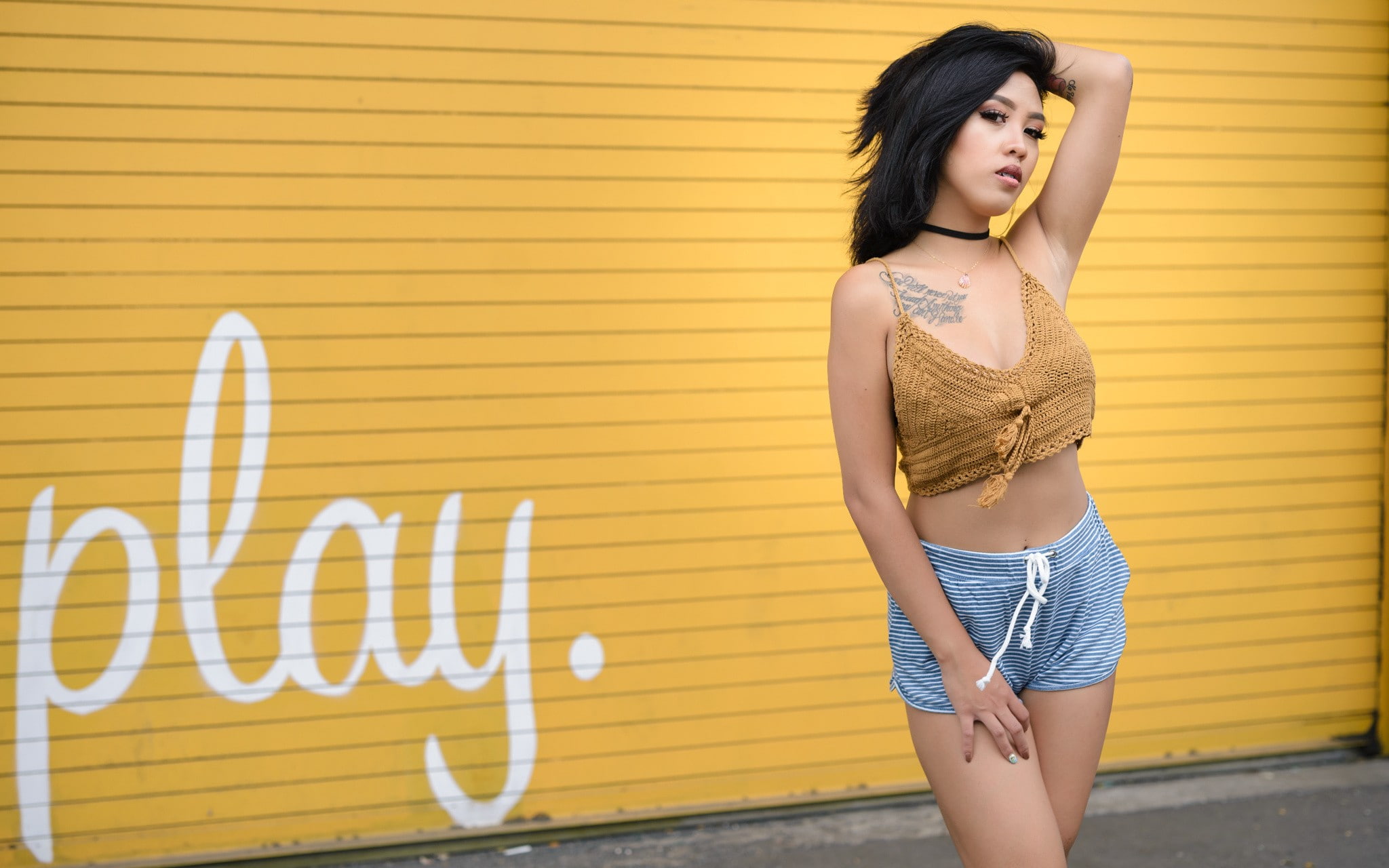 young women, standing, tattoo, one person, women, looking at viewer, architecture, shorts, hairstyle, wall, wall - building feature, yellow, young adult, HD Wallpaper