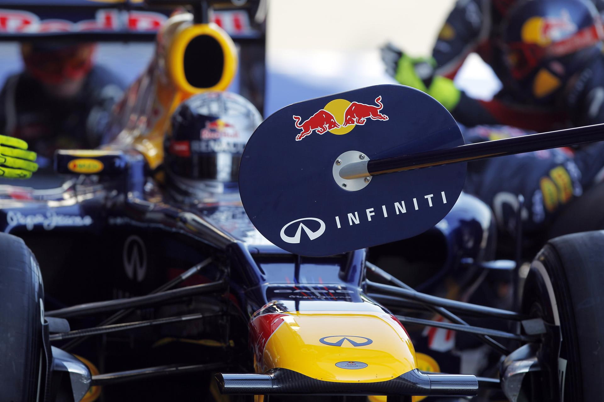 motor vehicle, rb, day, transportation, racing, car, sign, red, headwear, communication, safety, helmet, 1080P, outdoors, bull, crash helmet, focus on foreground, HD Wallpaper