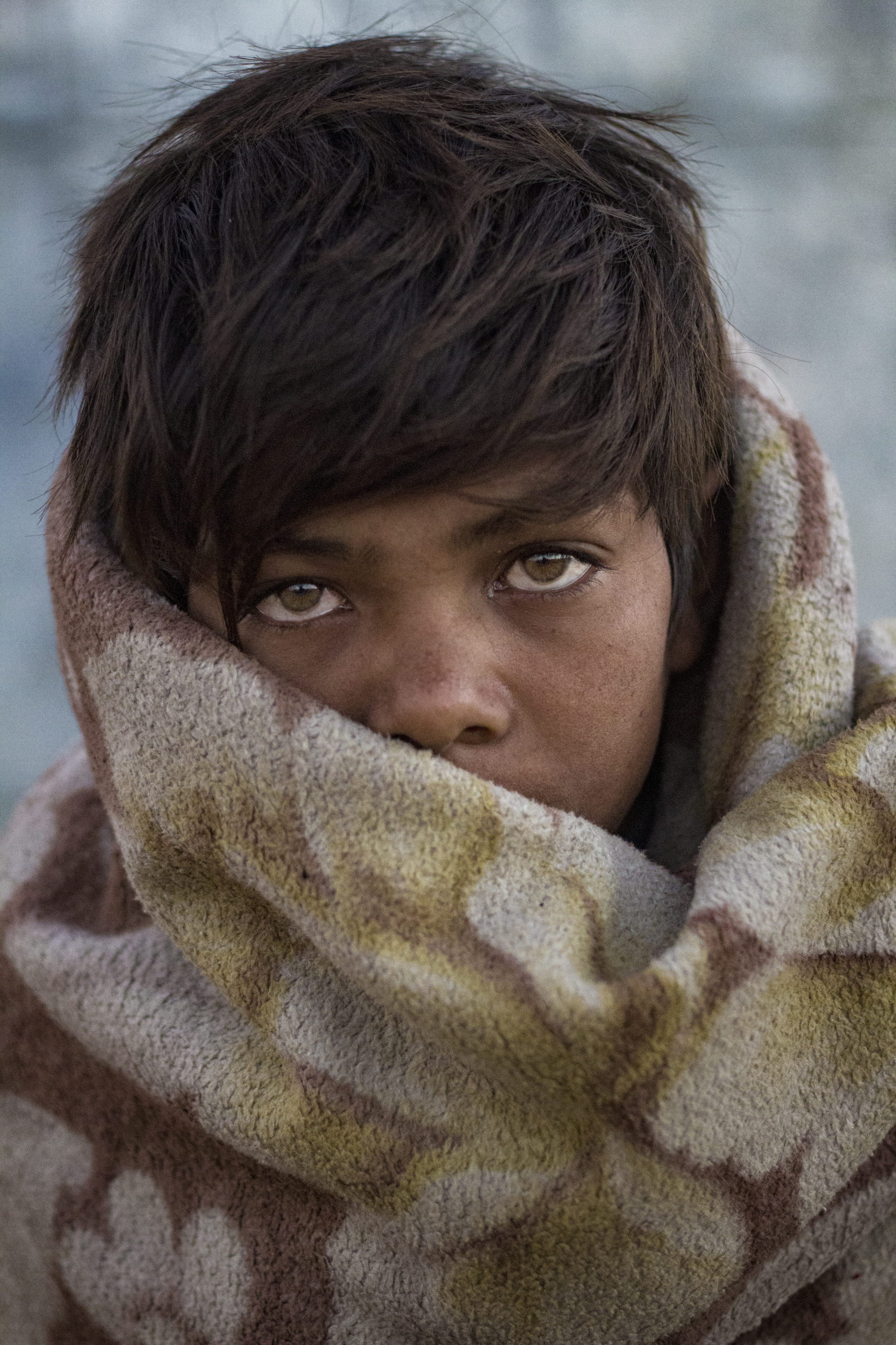 looking at camera, clothing, hood - clothing, human face, lifestyles, hair, warm clothing, blurred background, headshot, wrapped in a blanket, boy, obscured face, Phone HD Wallpaper