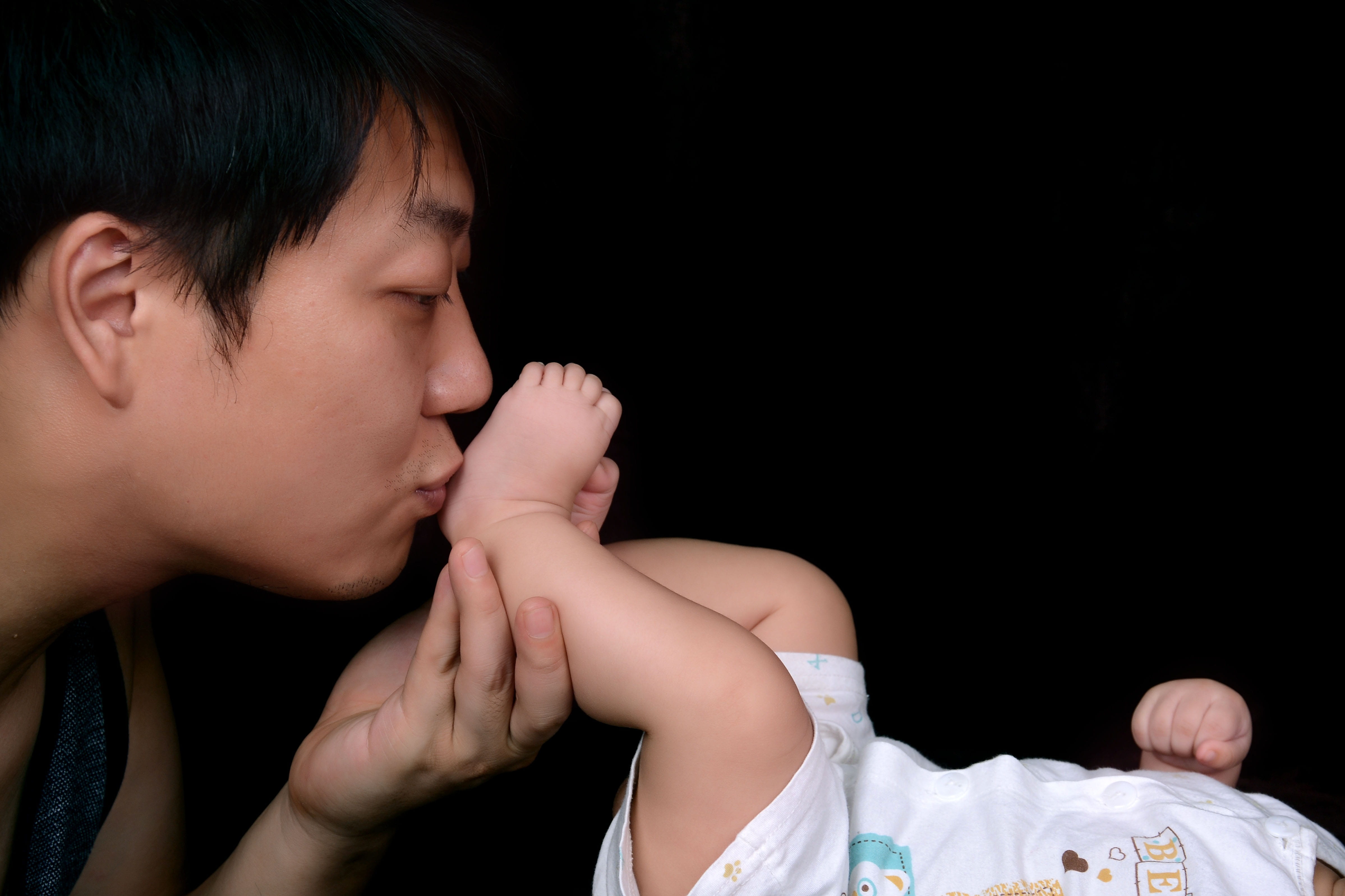 young adult, studio shot, human body part, positive emotion, profile view, people, black background, adult, man, child, indoors, males, baby, teenager, HD Wallpaper