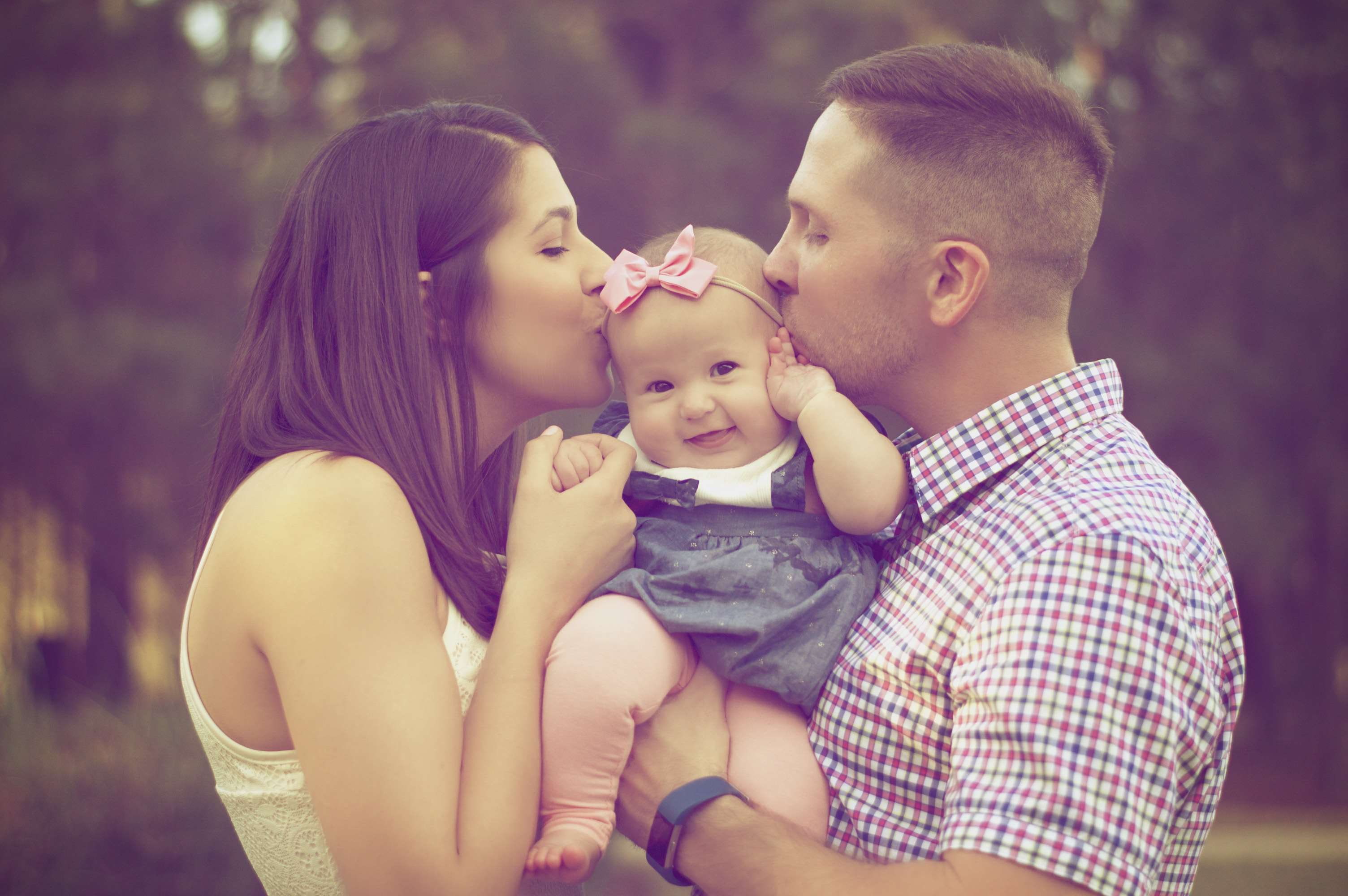blurred background, joy, family, fun, mother, childhood, smiling, moment, blur, young, innocence, kisses, 2K, beautiful, embracing, cute, young adult, HD Wallpaper