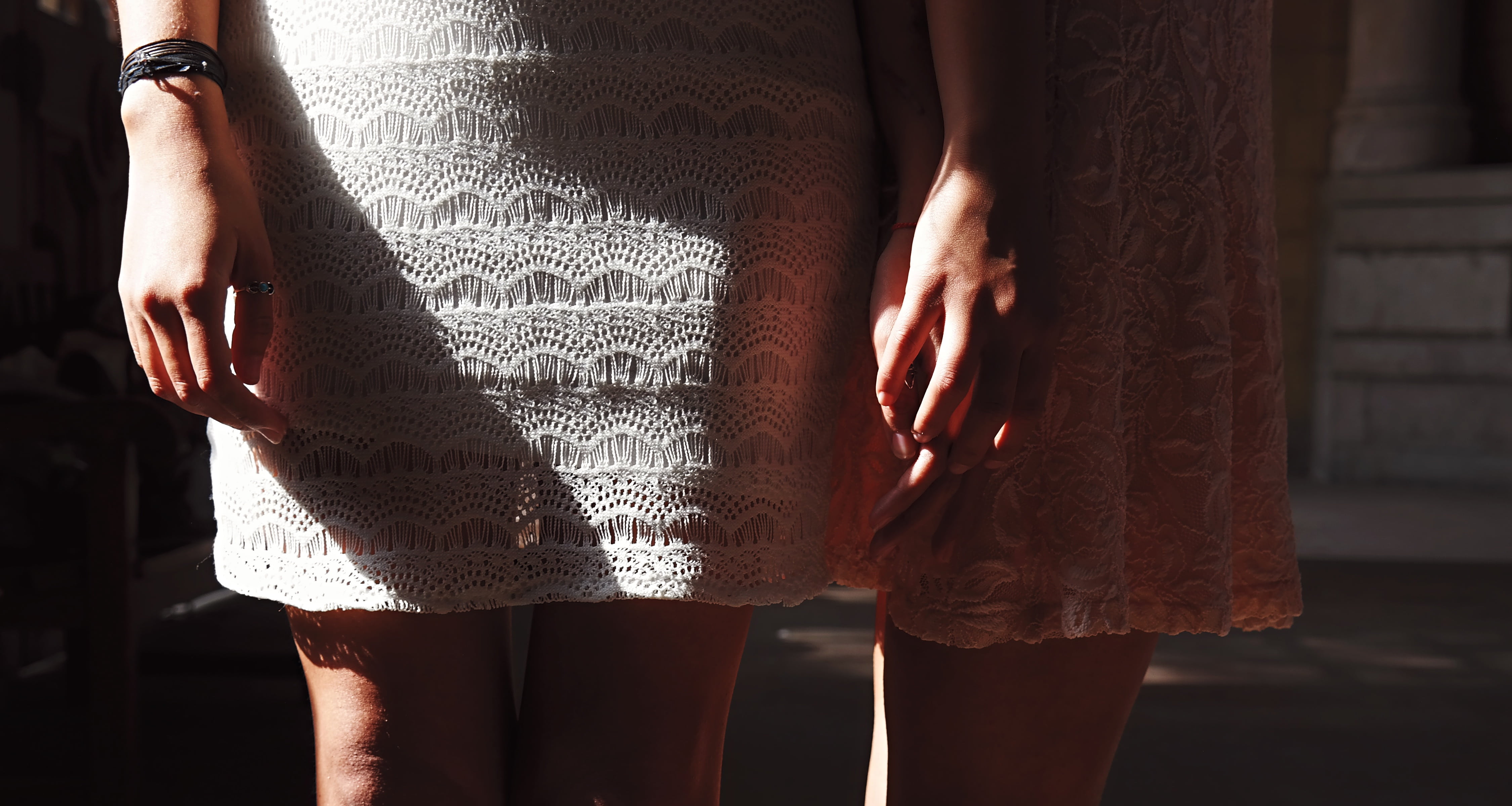 indoors, sunny, front view, women, real people, adult, legs, skirt, female, dress, lifestyles, two, midsection, friends, holding hand, bracelet, clothing, HD Wallpaper