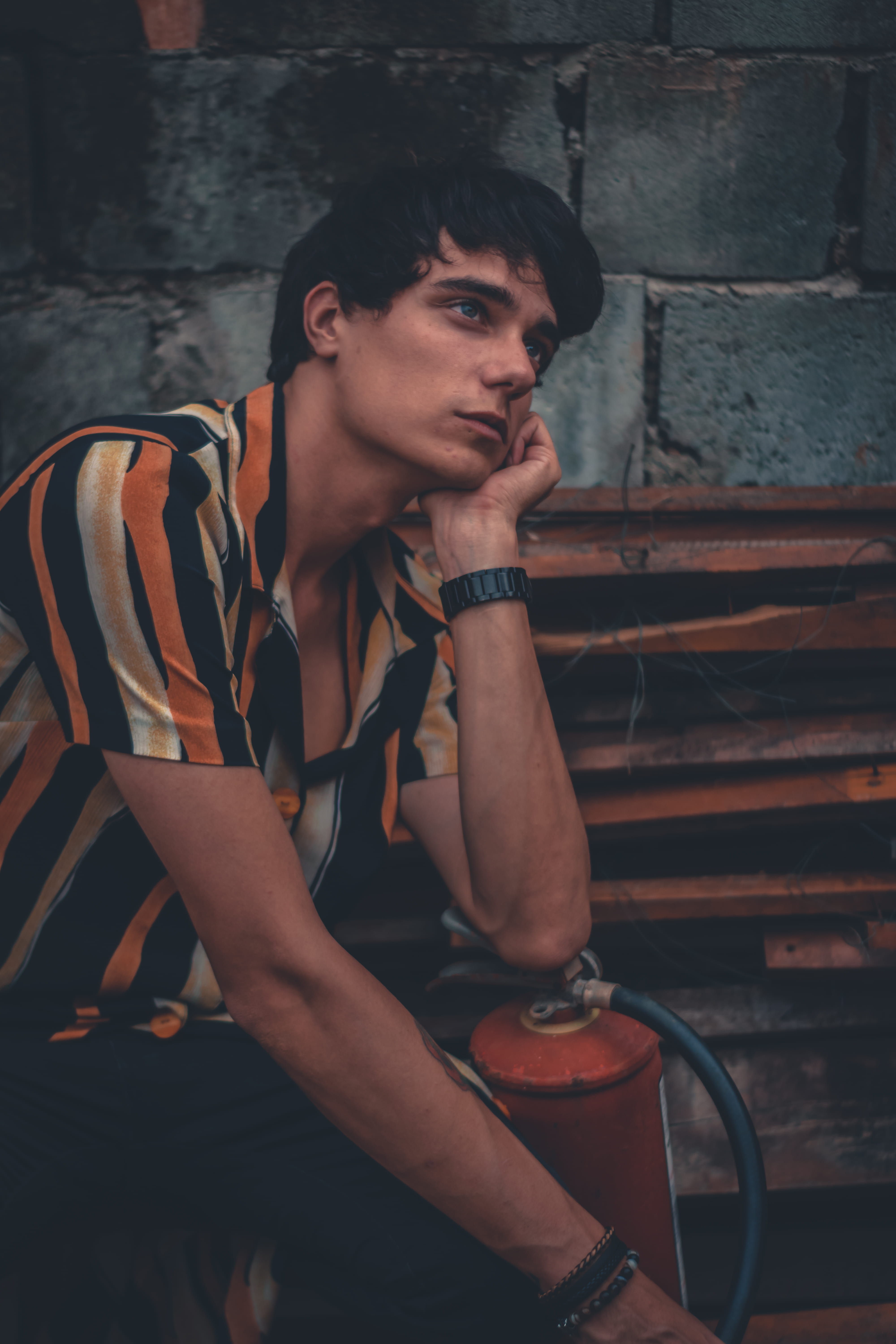male model, casual clothing, leaning, clothing, one person, photoshoot, beautiful people, outfit, looking away, contemplation, looking, lifestyles, handsome, Phone HD Wallpaper