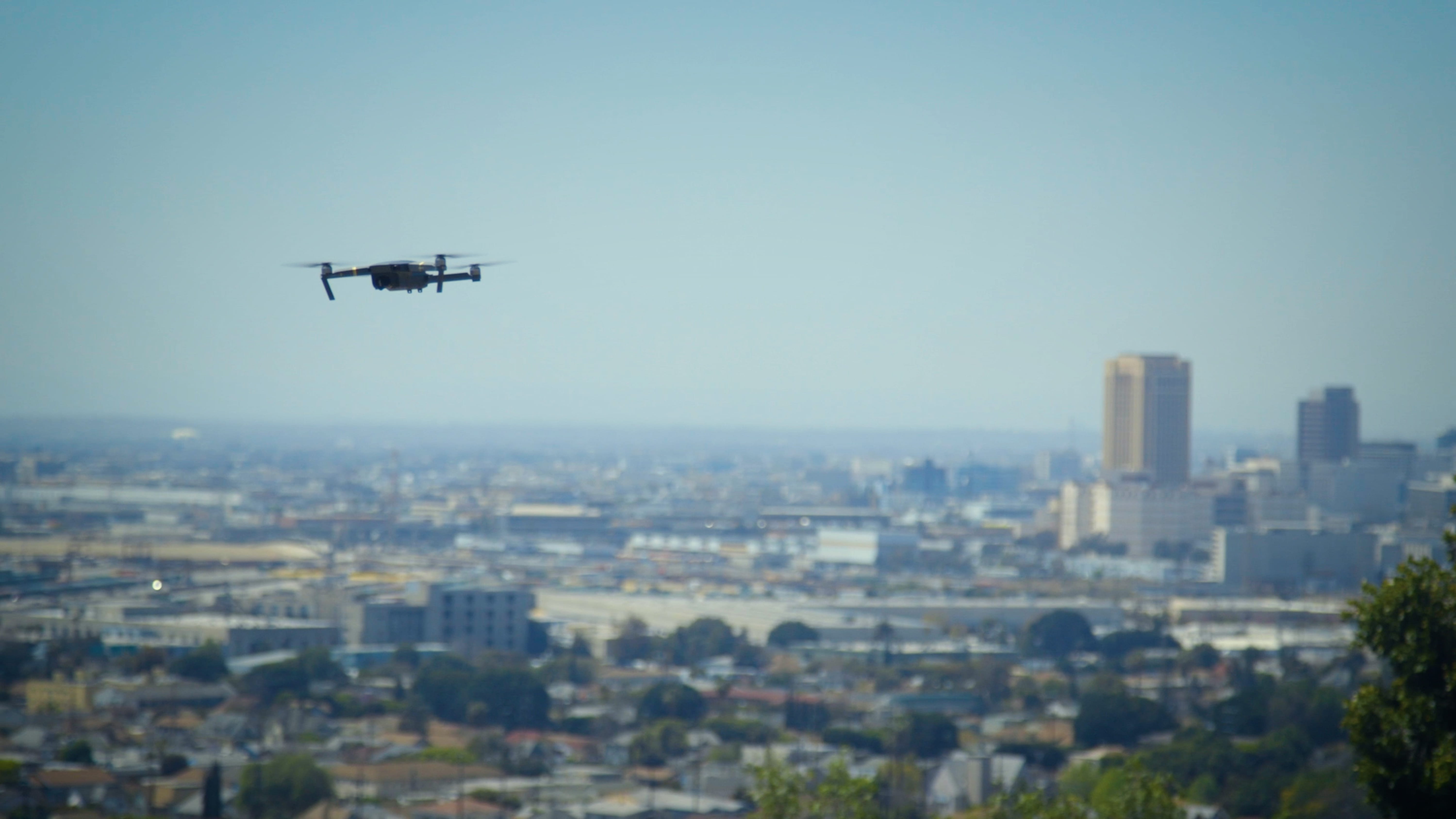 building exterior, drone footage, built structure, video camera, film gear, architecture, dji, air vehicle, clear sky, cinema equipment, outdoors, 5K, HD Wallpaper
