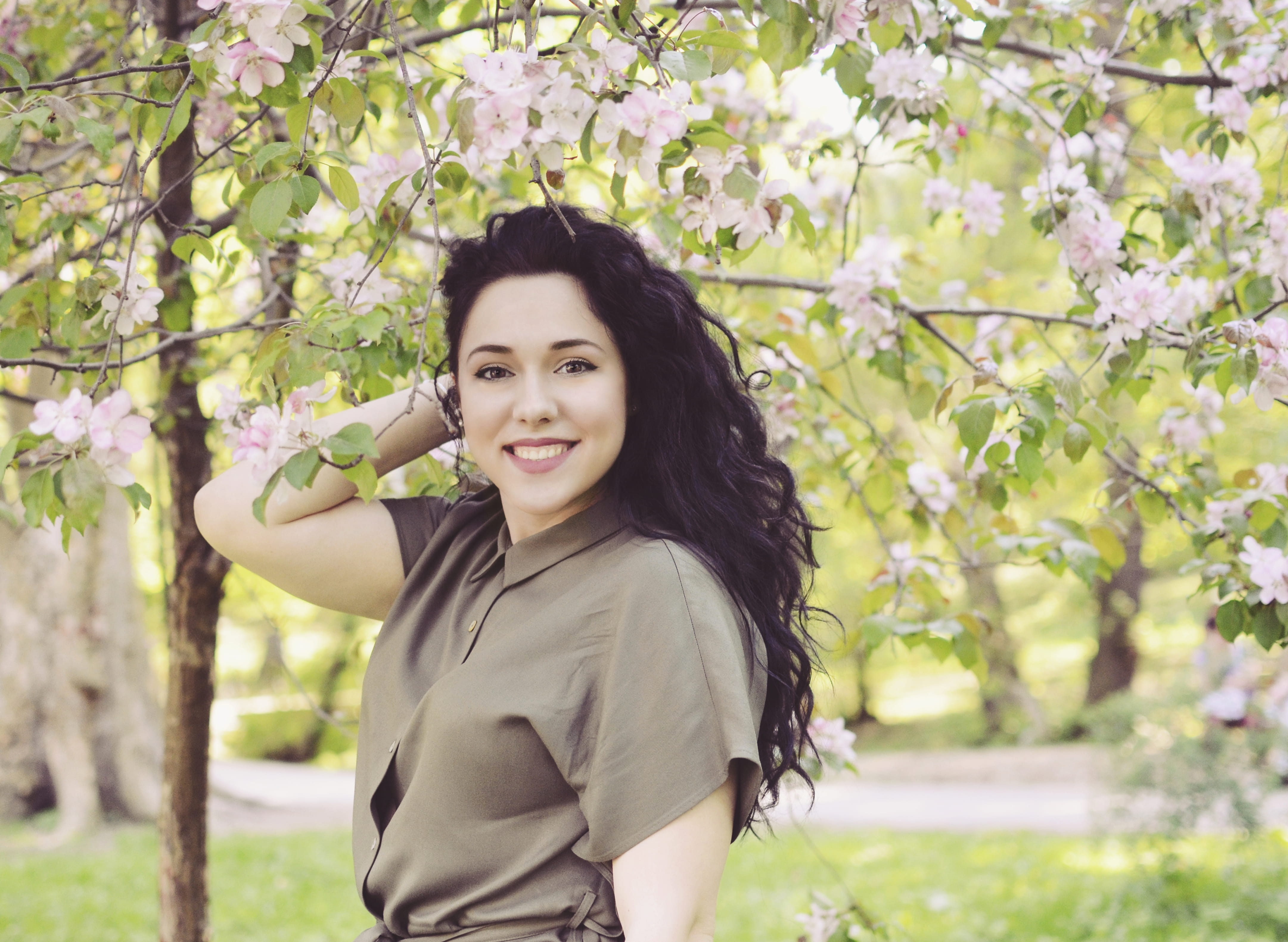 long hair, outdoors, near, leisure activity, tree, lifestyles, flowering plant, smile, plant, standing, woman, real people, nature, holding, hairstyle, HD Wallpaper
