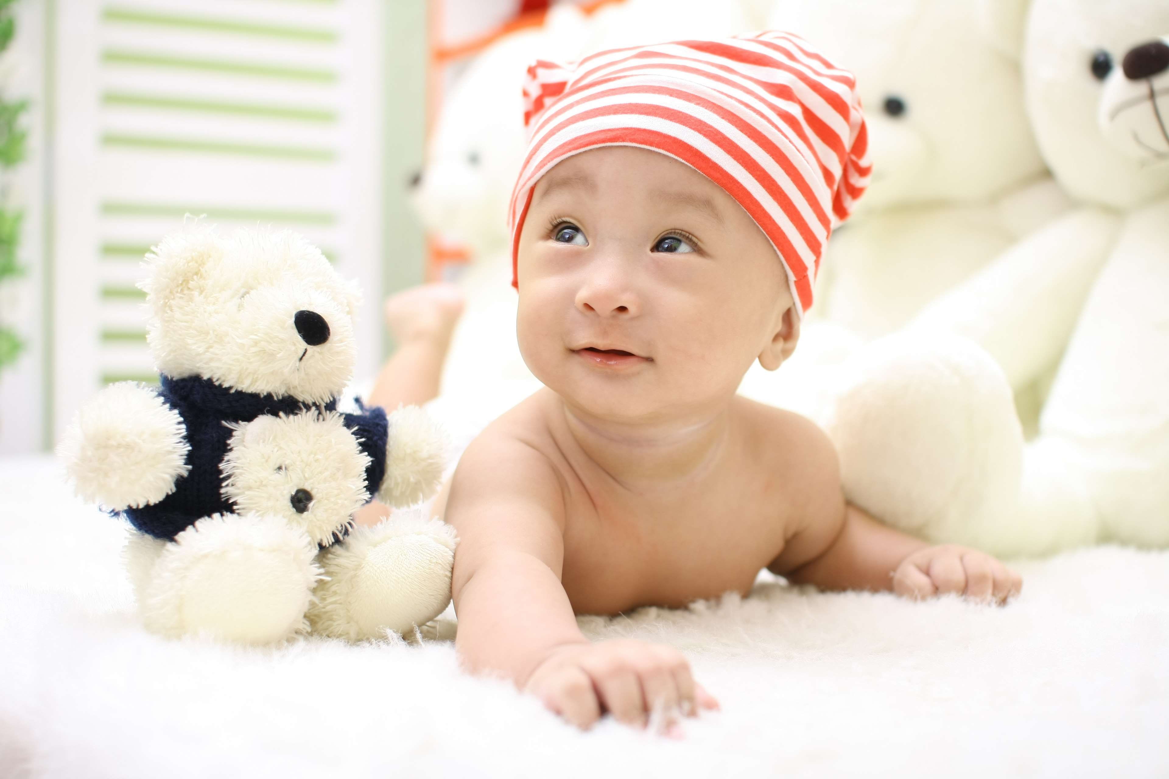 adorable, innocence, child, toy, kid, representation, indoors, selective focus, sitting, cute, lying, celebration, teddy bear, 4K, baby, young, softness, HD Wallpaper