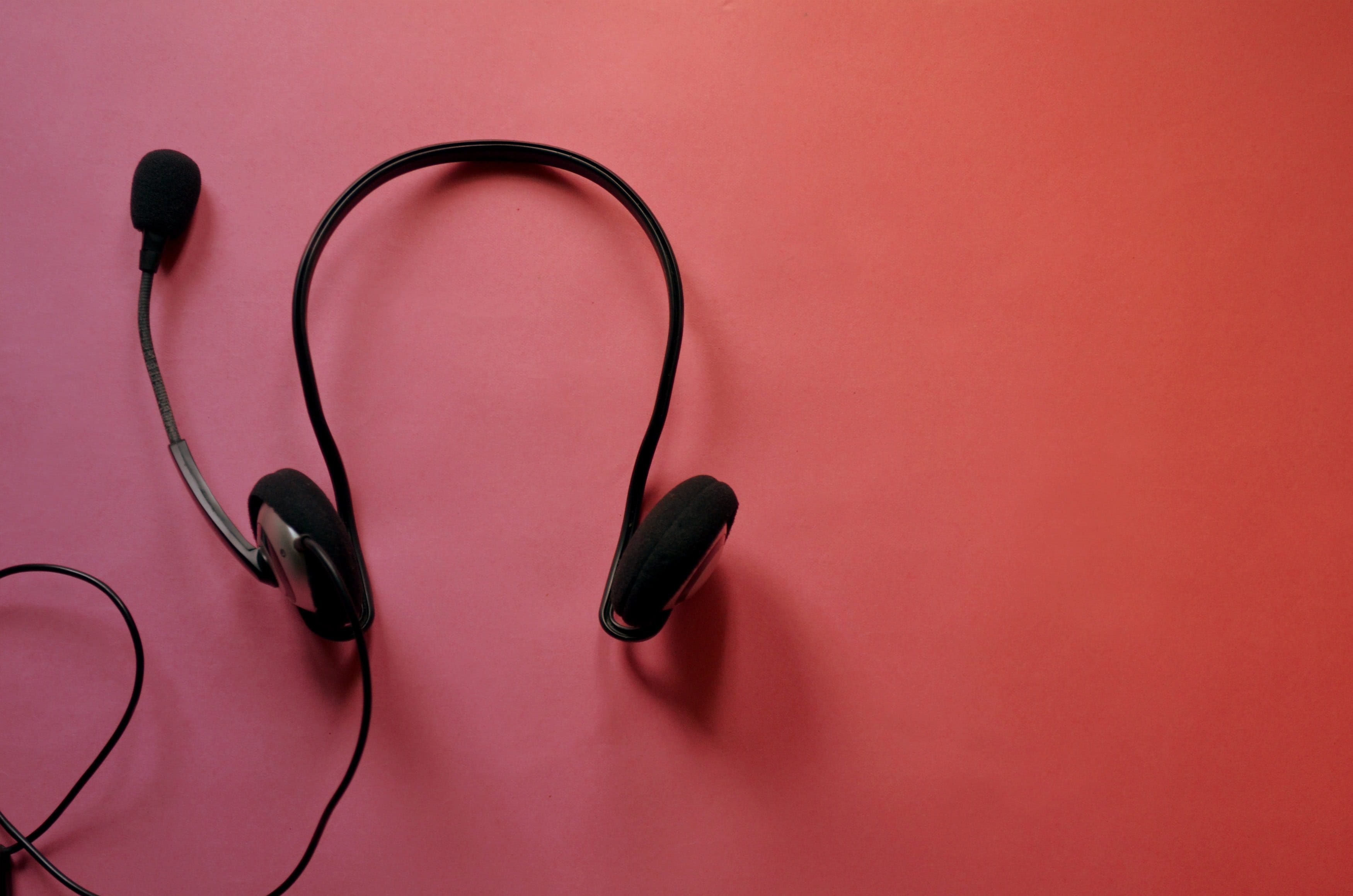 indoors, technology, ear phone, listening, no people, personal accessory, medical instrument, black color, 2K, copy space, simplicity, headphones, close-up, HD Wallpaper