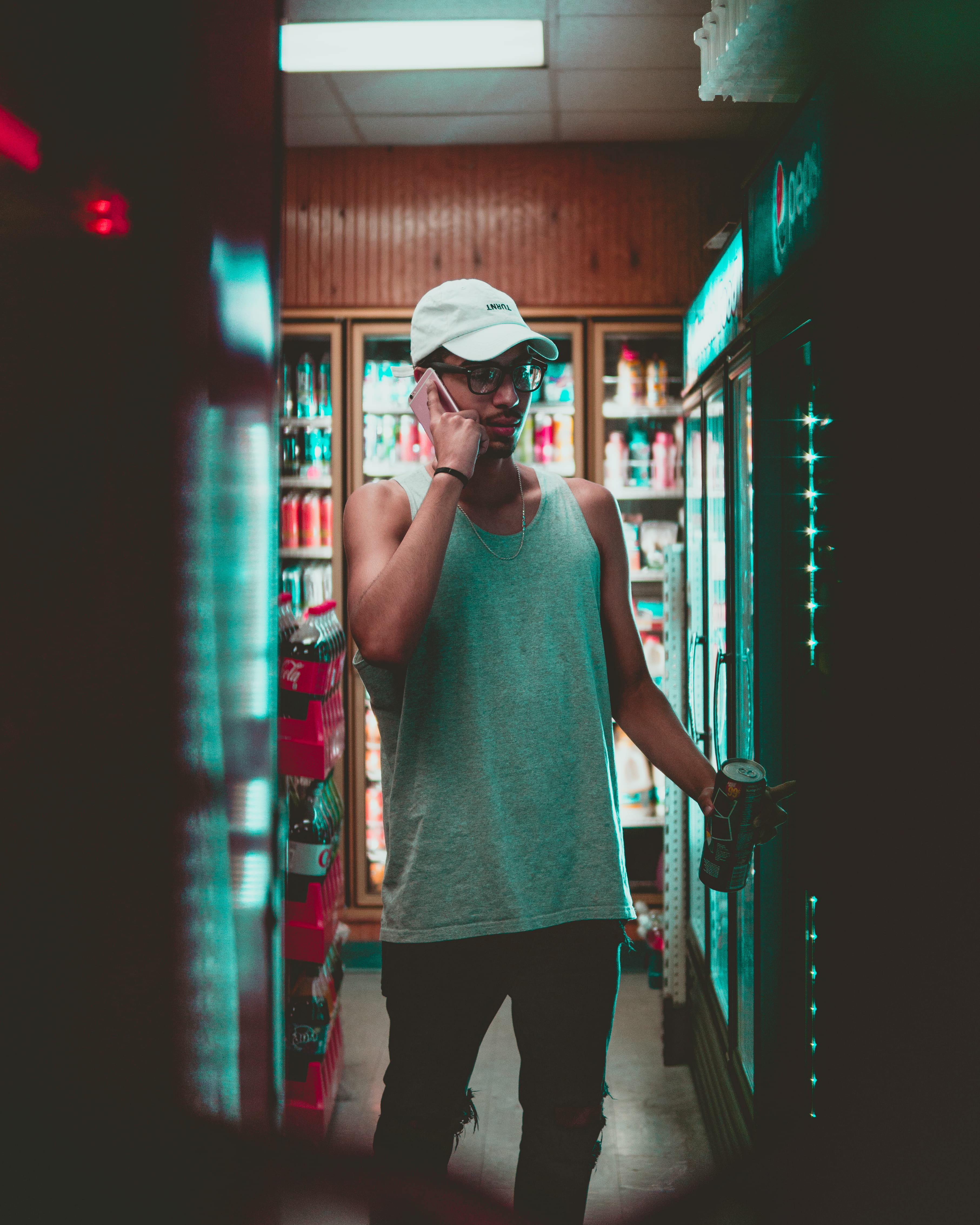 using, shelf, young men, drinks, one person, holding, store, indoors, phone, male, ear, front, beverage, cooler, can, putting, men, lifestyles, front view, Phone HD Wallpaper