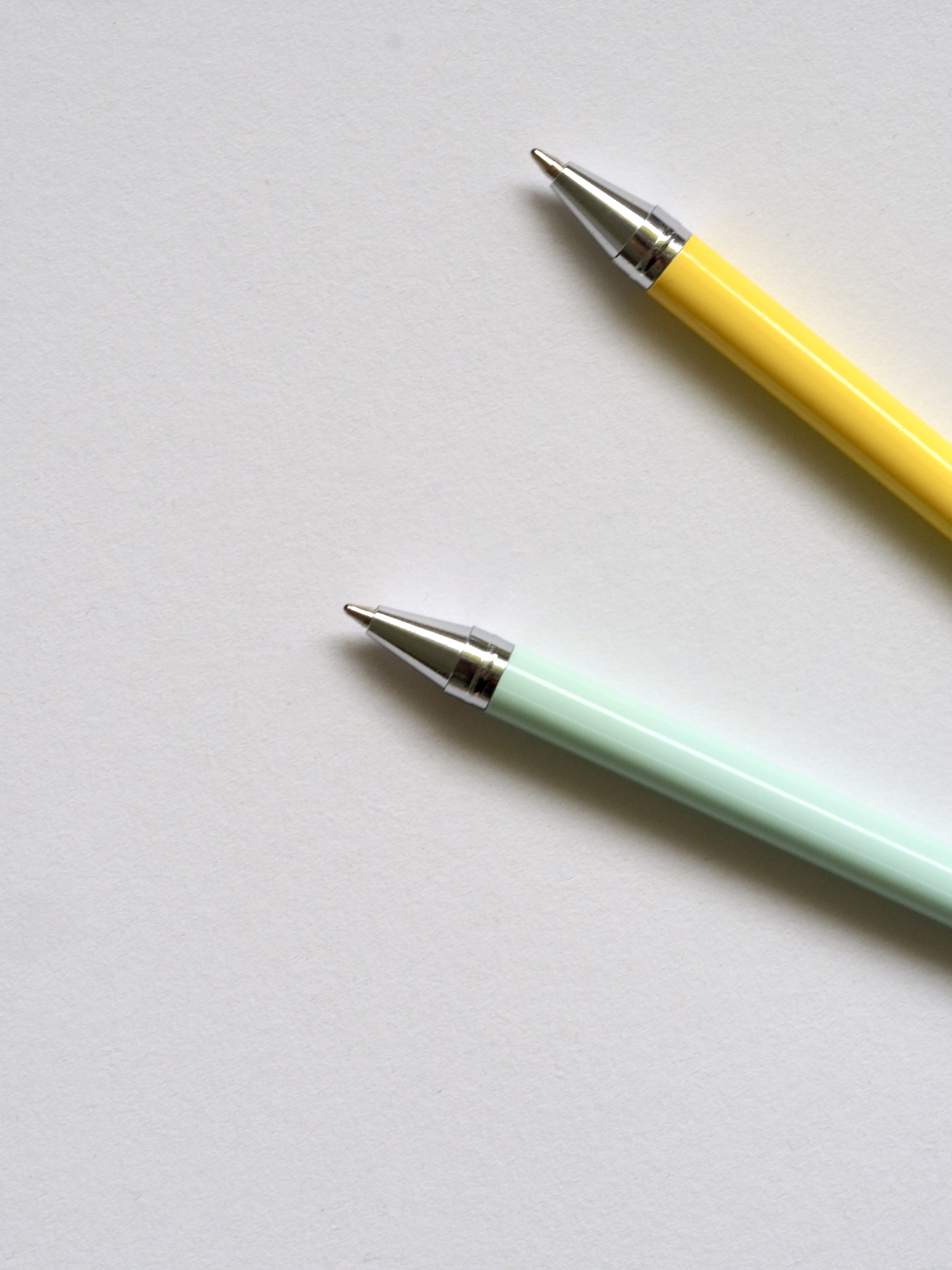 indoors, pencil, writing instrument, 4K, pen, office, photo, table, yellow, sharp, education, close-up, still life, high angle view, ballpens, white background, Phone HD Wallpaper