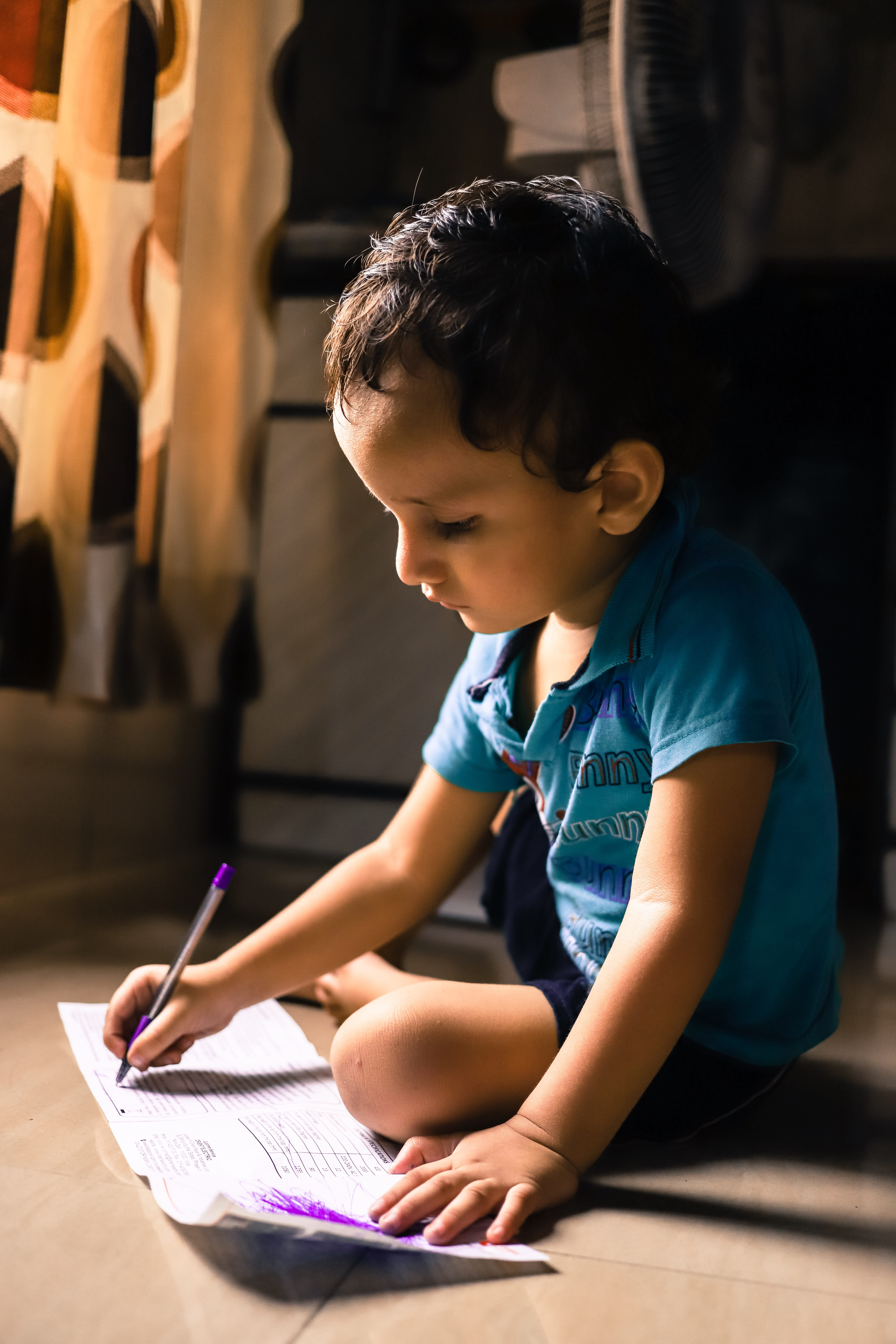 holding, childhood, sunlight, males, concentration, toddler, 5K, one person, boys, education, instead, floor, boy, writing, pen, portrait, book, hand, Phone HD Wallpaper