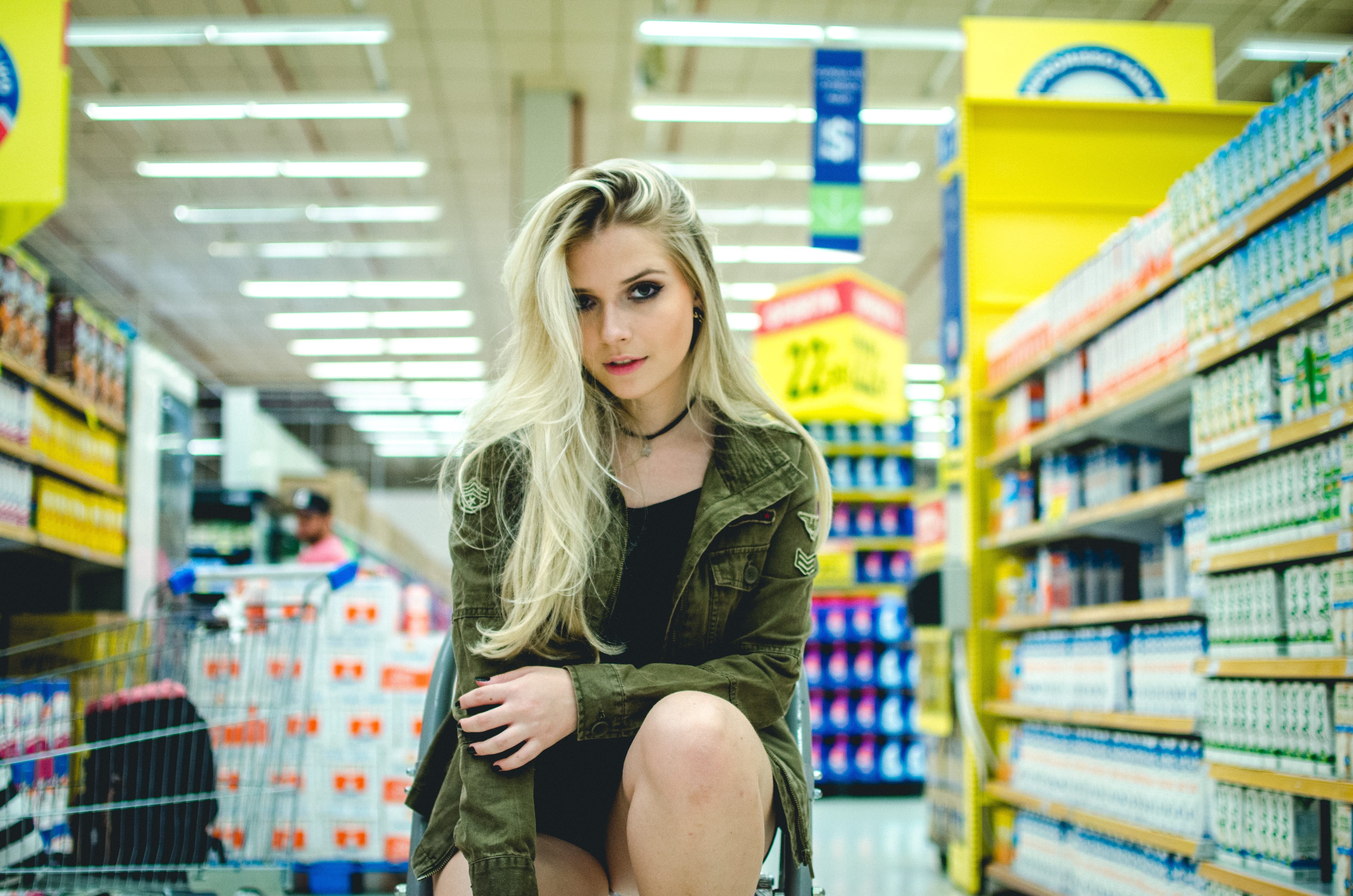 front view, retail, beauty, portrait, shelf, shopping, green, hair, model, groceries, store, jacket, close, photo, lights, indoors, lifestyles, 4K, young adult, HD Wallpaper