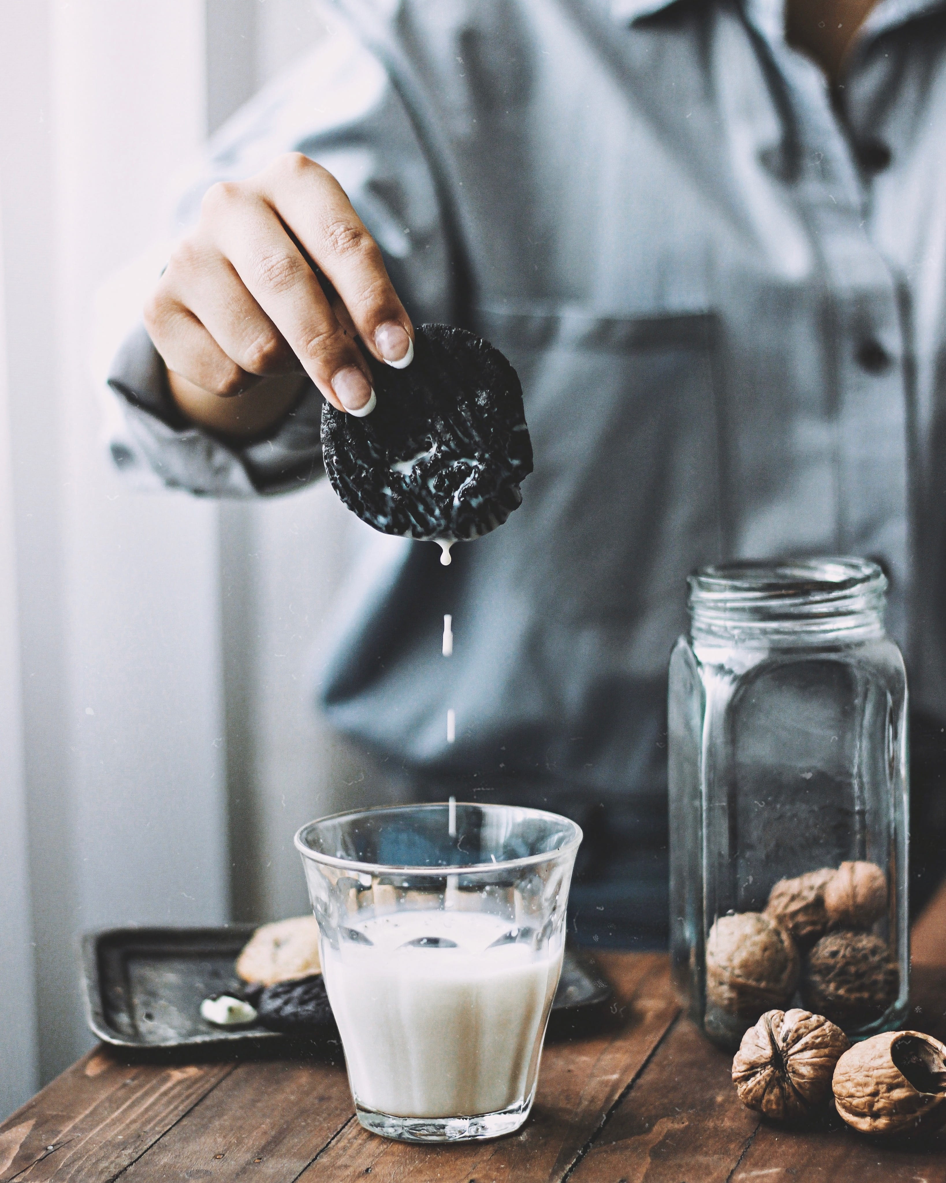 creme, freshness, human hand, container, nut, vegetable, dessert, real people, 4K, table, bottle, white, drinking glass, jar, finger, pouring, food, cookie, Phone HD Wallpaper