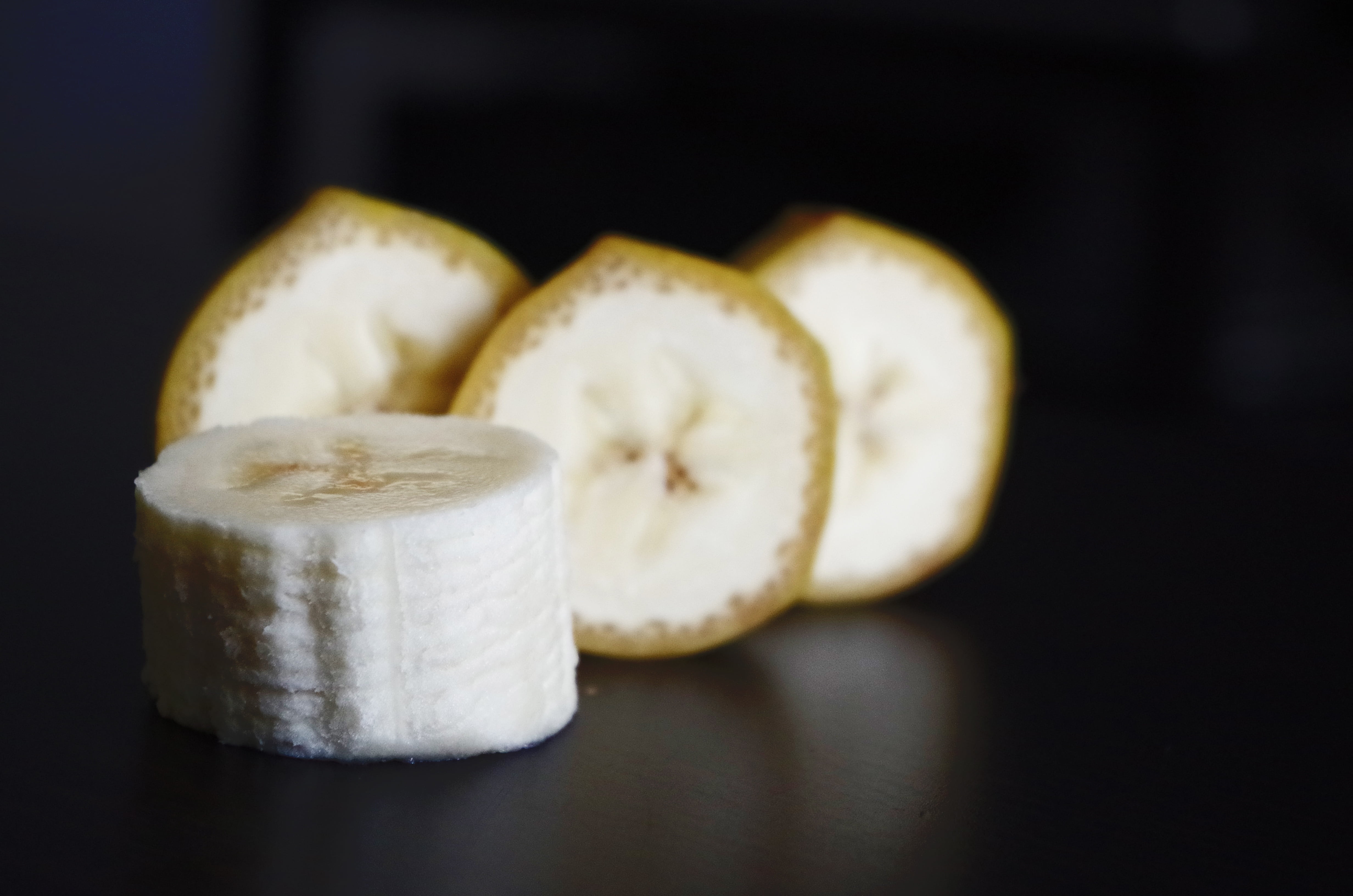 white color, focus on foreground, cross section, pieces, indoors, banana, food and drink, chinese food, 4K, still life, black background, fruit, studio shot, HD Wallpaper