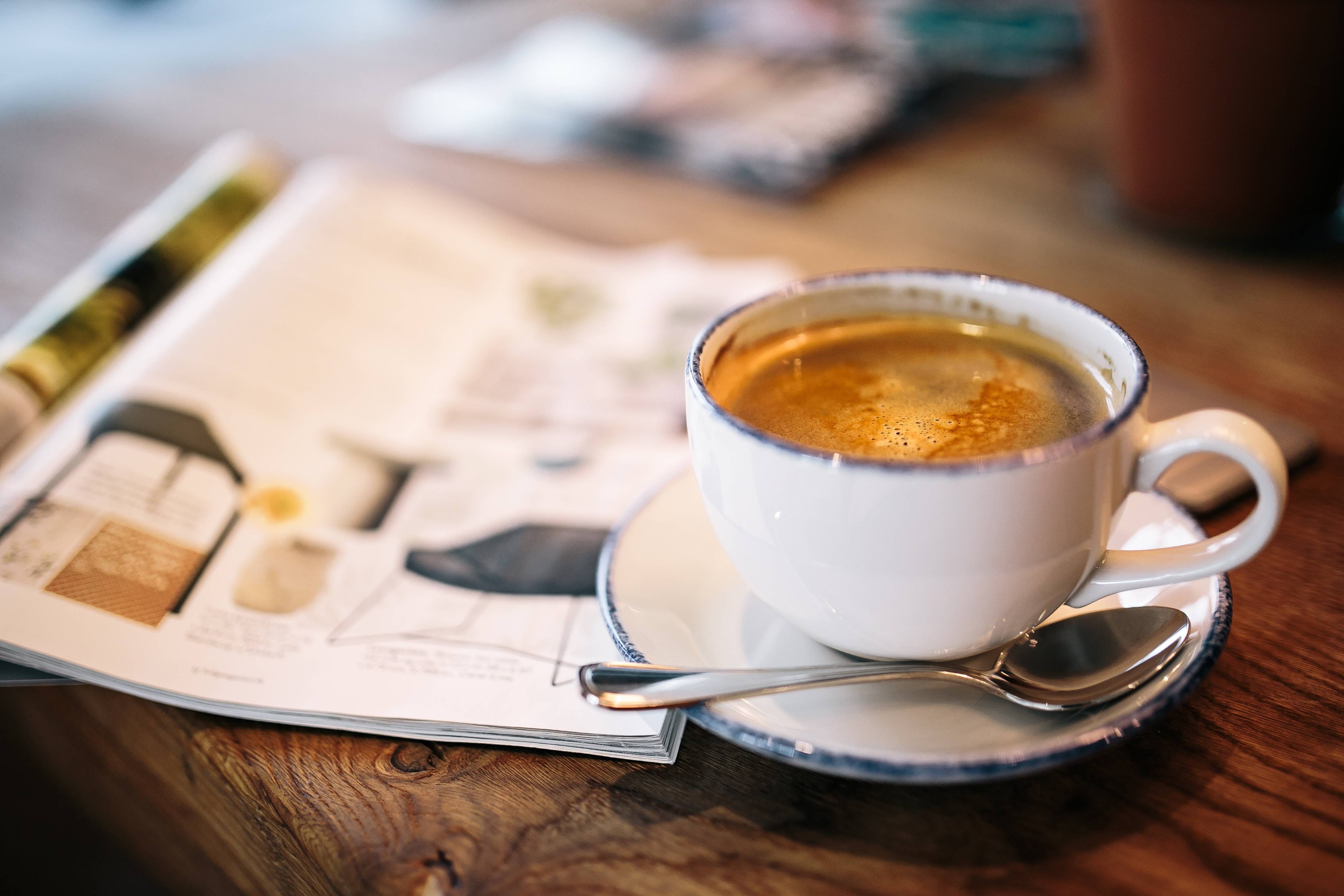 glass, eating utensil, newspaper, puro hotel, interior, spoon, cup, 4K, coffee cup, mug, Gdansk, crockery, visit, refreshment, coffee, food and drink, HD Wallpaper