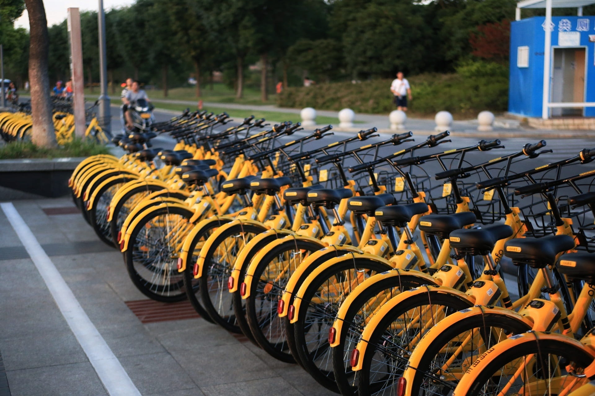 outdoors, focus on foreground, transportation, repetition, road, wheel, shared bike, large group of objects, 1080P, the little yellow car, mode of transportation, HD Wallpaper