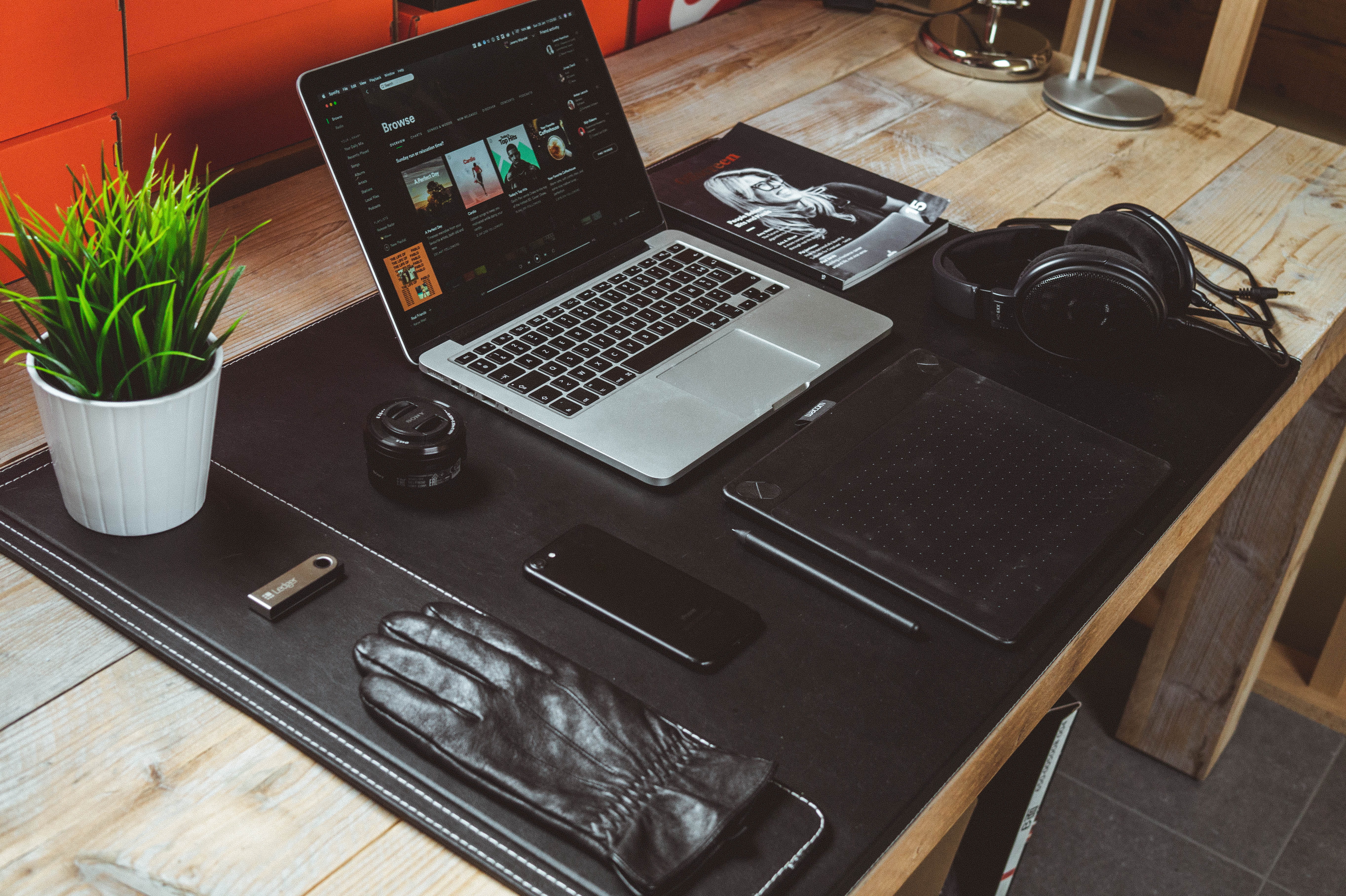 potted plant, wooden table, plants, iphone, pot, indoors, home interior, pen, magazine, glove, pro, 5K, still life, communication, display, macbook, portable information device, HD Wallpaper