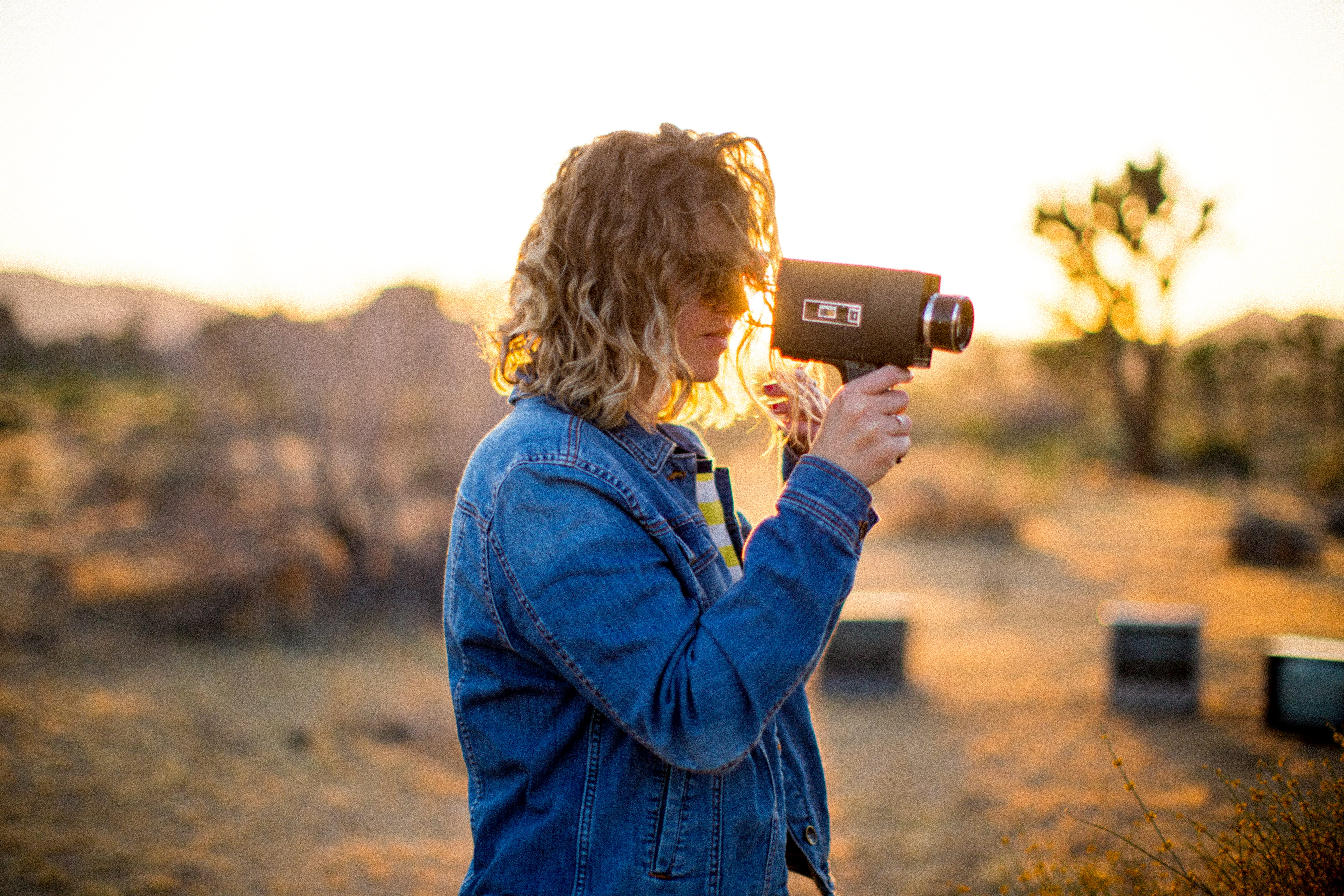 lifestyles, casual clothing, activity, sunset, photographing, standing, denim, photographer, technology, one person, photography themes, clothing, focus on foreground, HD Wallpaper