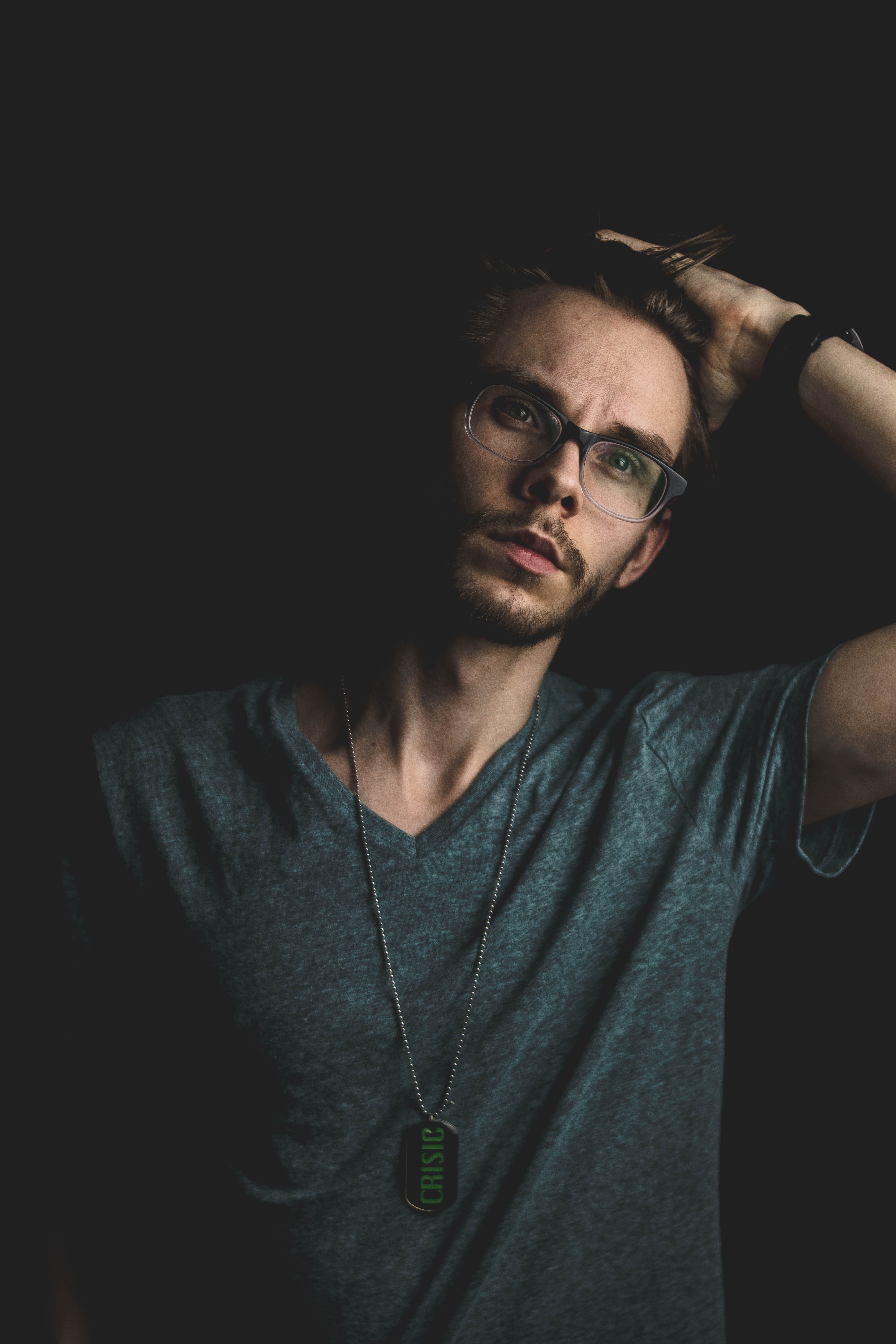 portrait, gray, mid adult, waist up, eyeglasses, black background, indoors, lifestyles, looking at camera, man, glasses, dog, v, casual clothing, neck, Phone HD Wallpaper