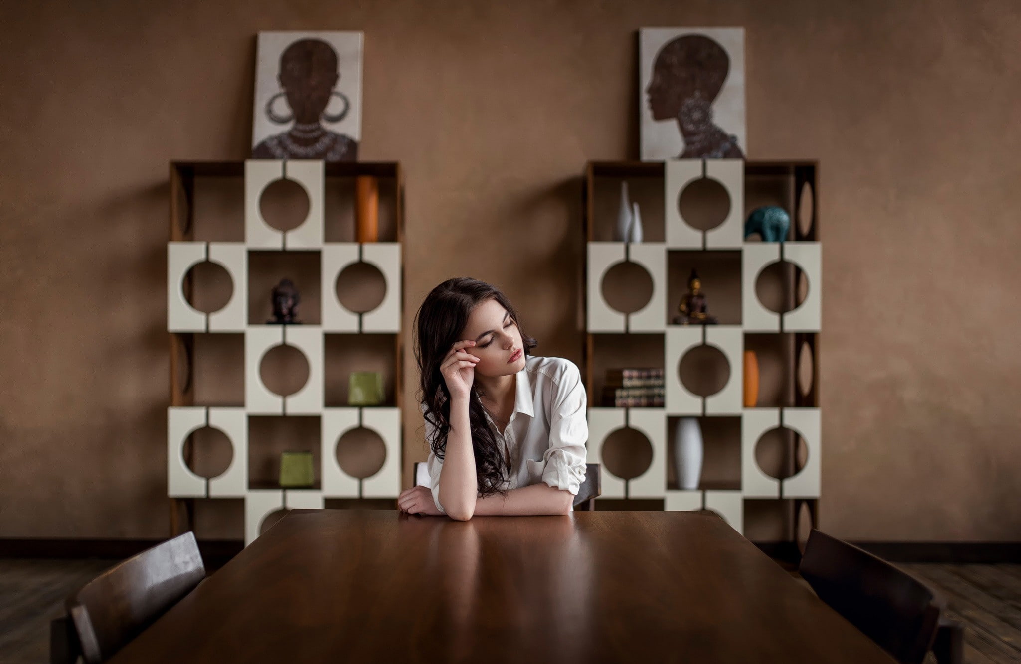sitting, hand, women, model, emotion, table, front view, blouses, contemplation, indoors, sculpture, brunette, headshot, adult, communication, shelves, HD Wallpaper