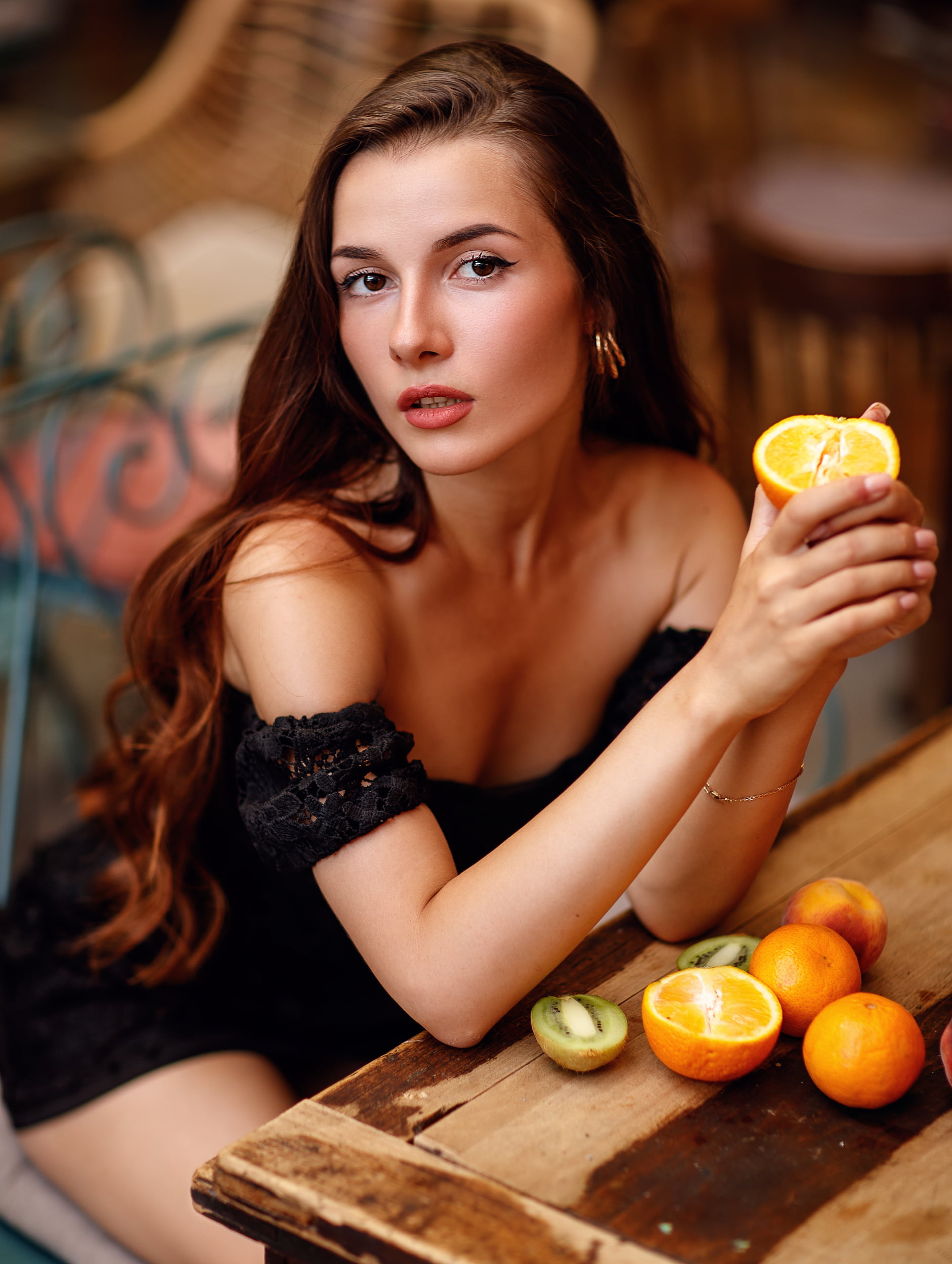 fruit, women, Sergey Sorokin, high angle, orange (fruit), 1080P, kiwi (fruit), makeup, brunette, bare shoulders, looking at viewer, blush, long hair, Phone HD Wallpaper