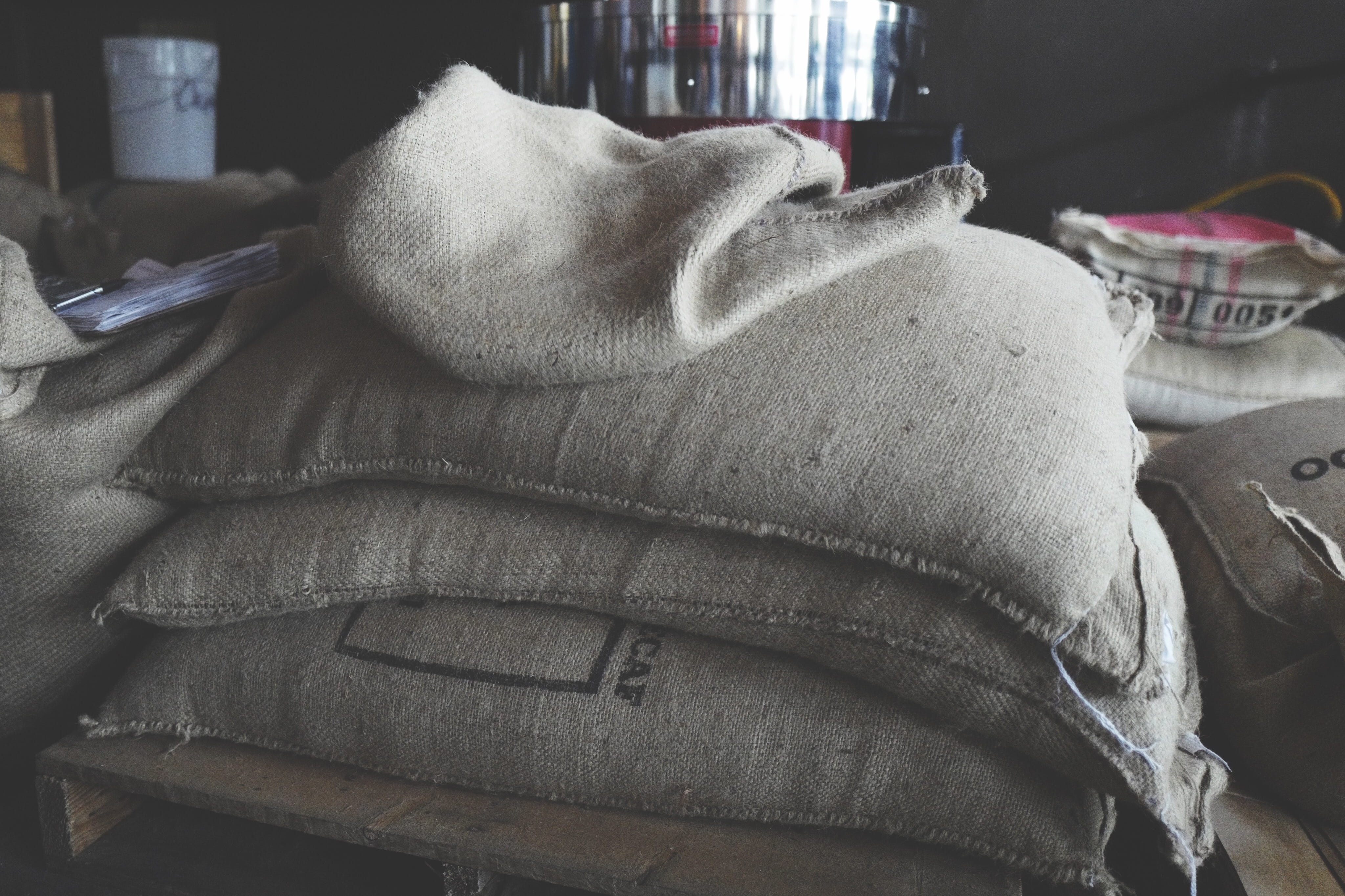warm clothing, table, burlap, 4K, jeans, no people, absence, furniture, still life, technology, beans, personal accessory, equipment, bag, coffee, clothing, HD Wallpaper