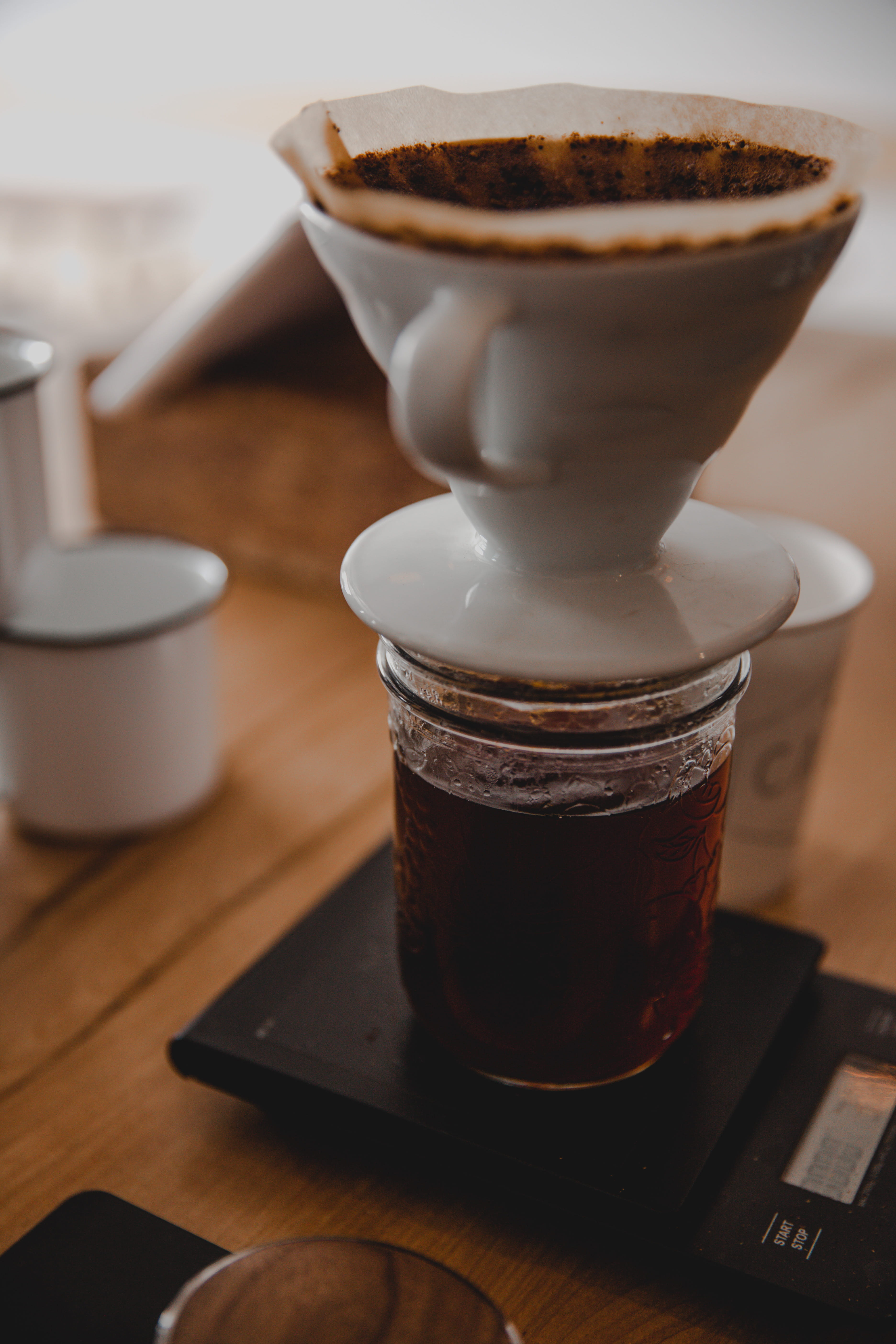 focus on foreground, canada, canoe coffee roasters, selective focus, sweet food, mood, pour over, sweet, still life, coffee - drink, wood - material, table, Phone HD Wallpaper