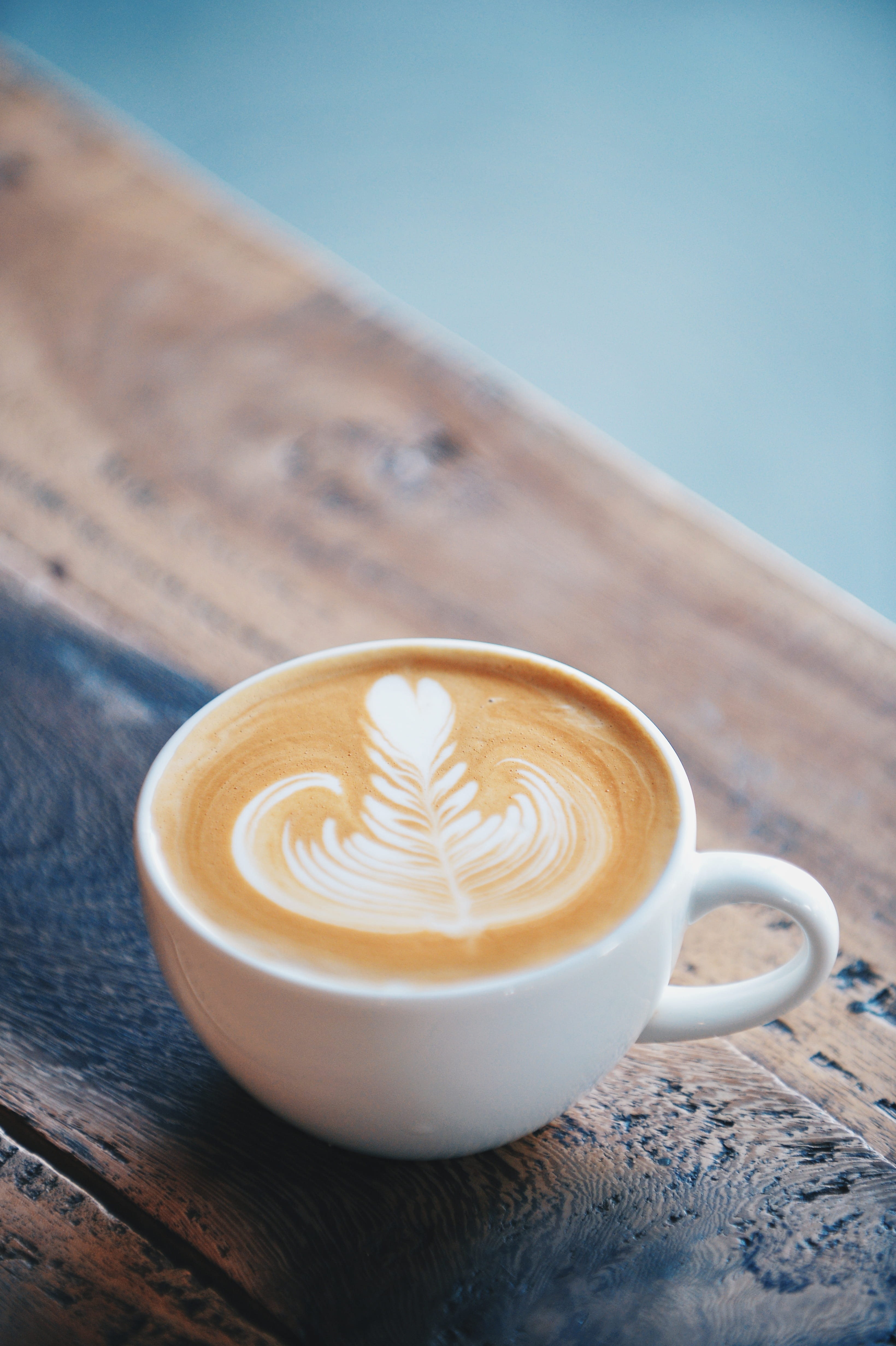 frothy drink, coffeehouse, coffee, latte, mug, milk, wood - material, spoon, coffee cup, close-up, still life, hot drink, focus on foreground, coffee - drink, Phone HD Wallpaper