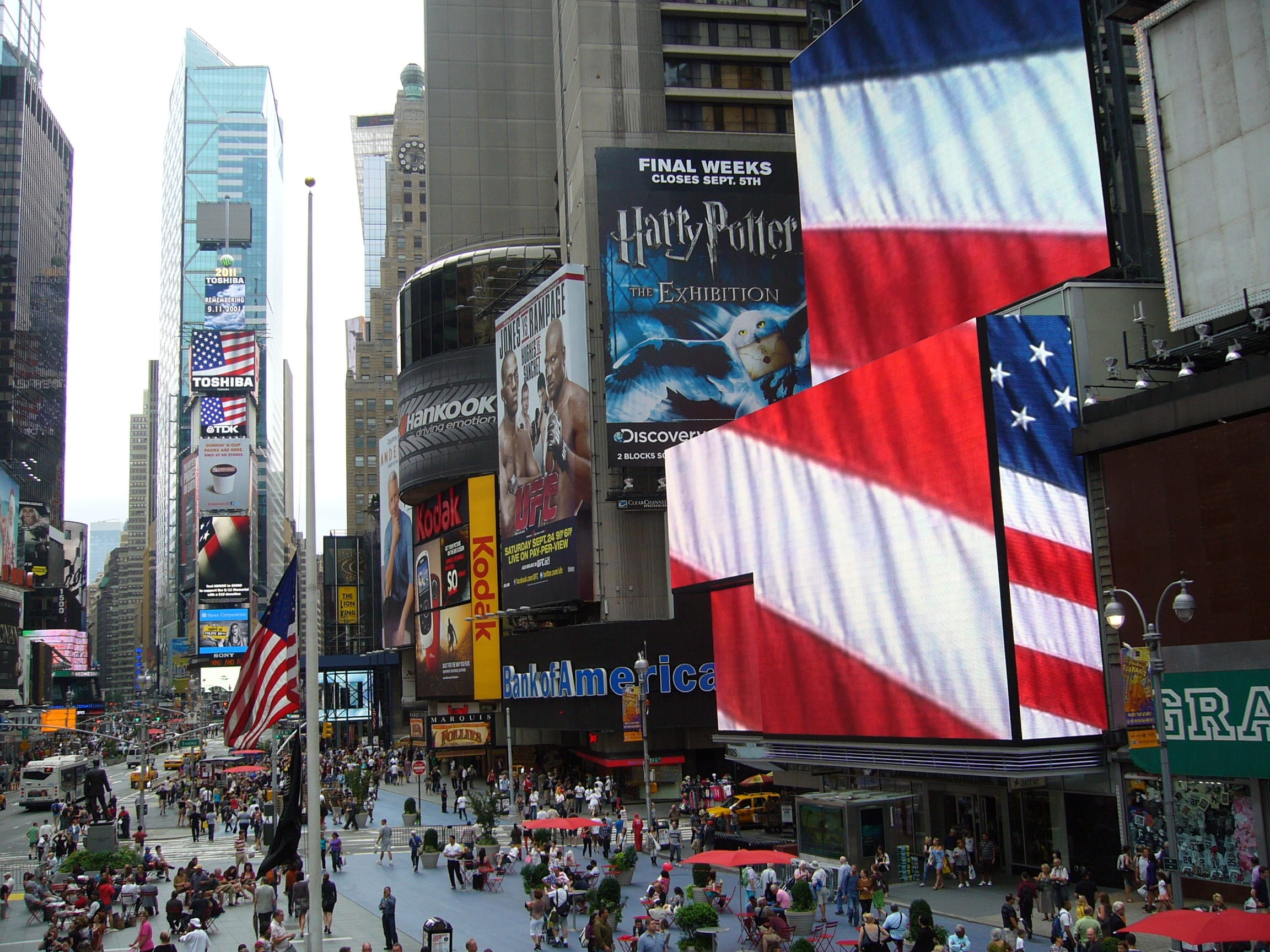 tarpaulin, boost, city, building, skyscraper, times square, architecture, crowd, text, advertisement, modern, daytime, flag, financial district, 1080P, HD Wallpaper