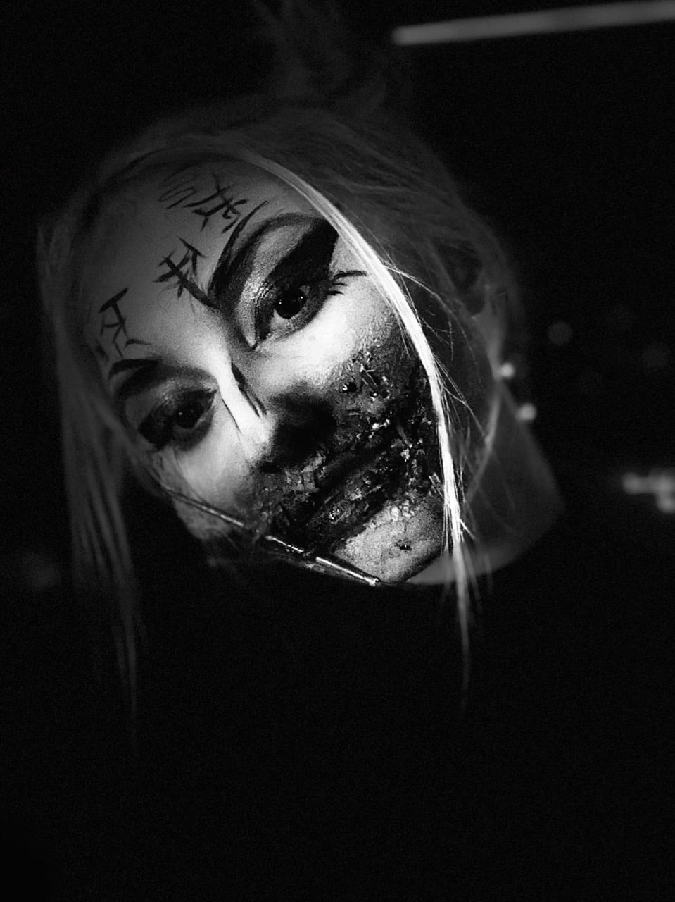 eyeshadow, looking at viewer, face paint, makeup, monochrome, letter, dark, lipstick, Chinese, vertical, hairbun, 720P, black clothing, dark eyes, dark background, Phone HD Wallpaper