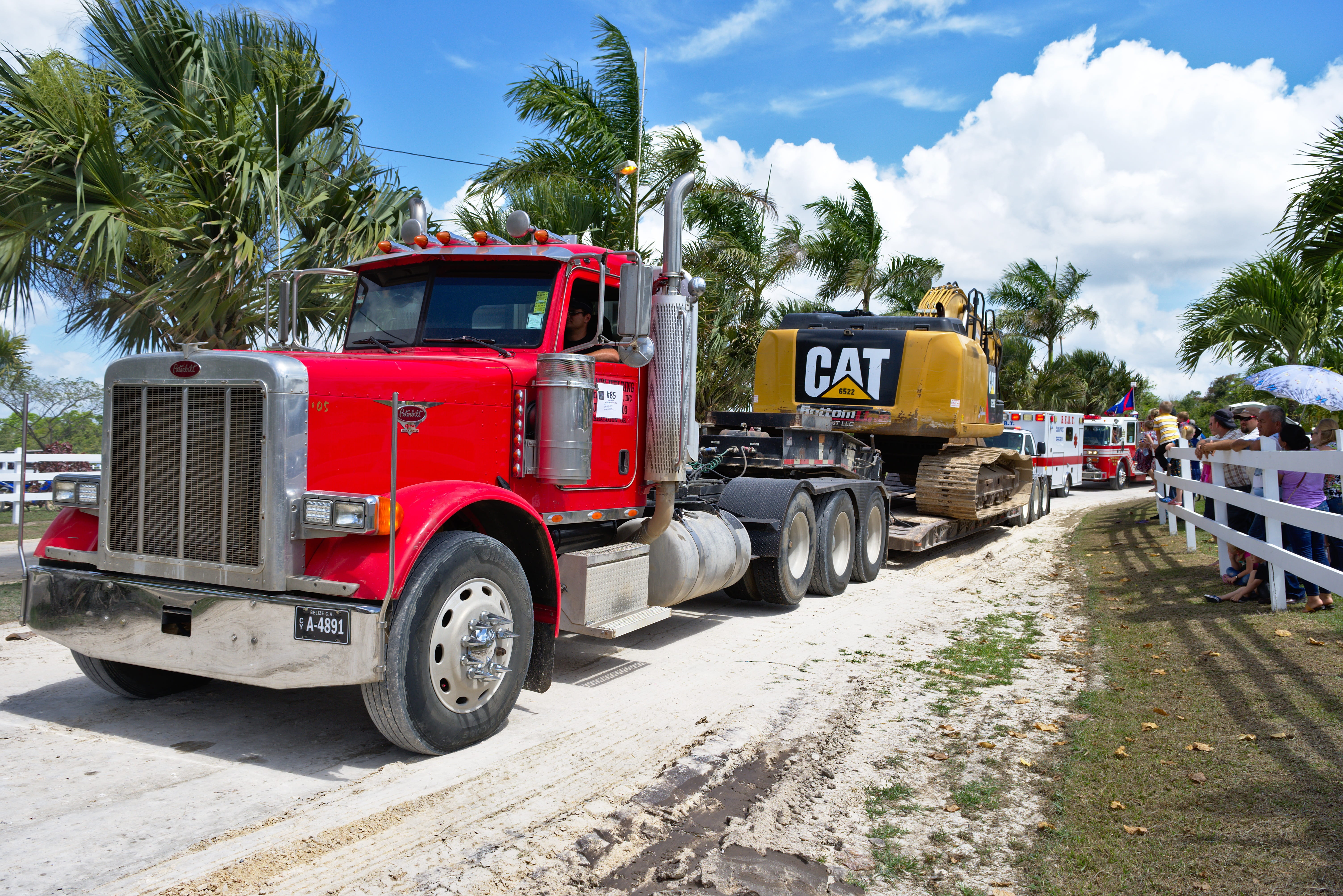 motor vehicle, transportation system, big rig, tree, outdoors, parade, street, no people, pick-up truck, haul, land vehicle, heavy load, cloud - sky, sunlight, HD Wallpaper